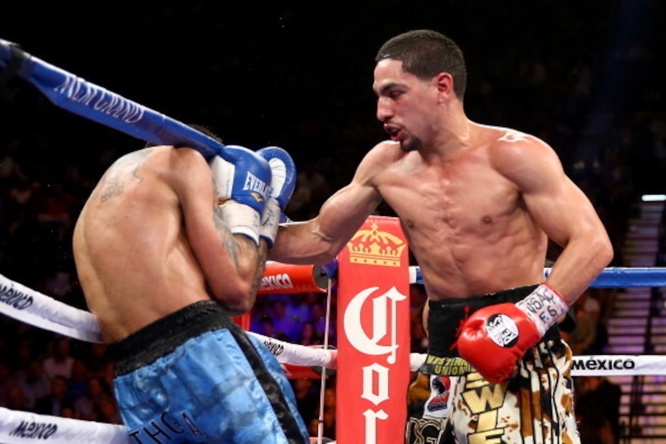 LAS VEGAS, NV - SEPTEMBER 14:  (R-L) Danny Garcia throws a right at Lucas Matthysse during their WBC/WBA super lightweight title fight at the MGM Grand Garden Arena on September 14, 2013 in Las Vegas, Nevada.  (Photo by Al Bello/Getty Images)