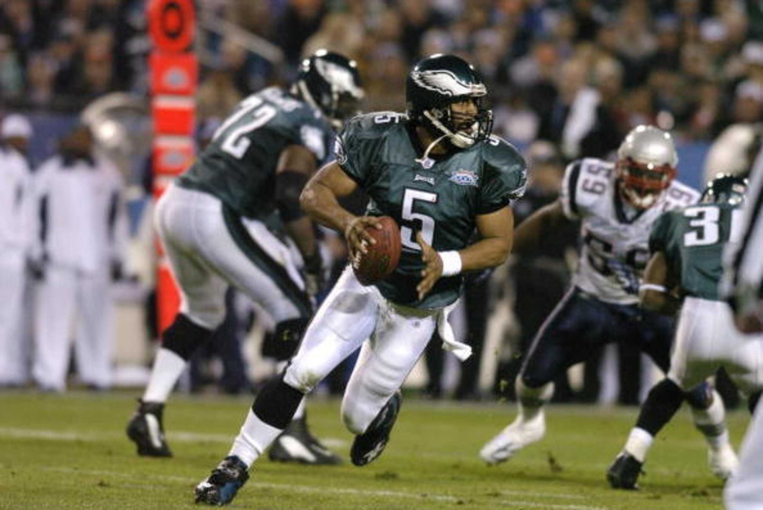 Philadelphia Eagle's QB Donovan McNabb with the ball during the first quarter of Super Bowl XXXIX between the Eagles and the New England Patriots at Alltel Stadium in Jacksonville, Florida on February 6, 2005. (Photo by Al Messerschmidt/Getty Images) Philadelphia Eagle's QB Donovan McNabb with the ball during the first quarter of Super Bowl XXXIX between the Eagles and the New England Patriots at Alltel Stadium in Jacksonville, Florida on February 6, 2005. (Photo by Al Messerschmidt/Getty Images)