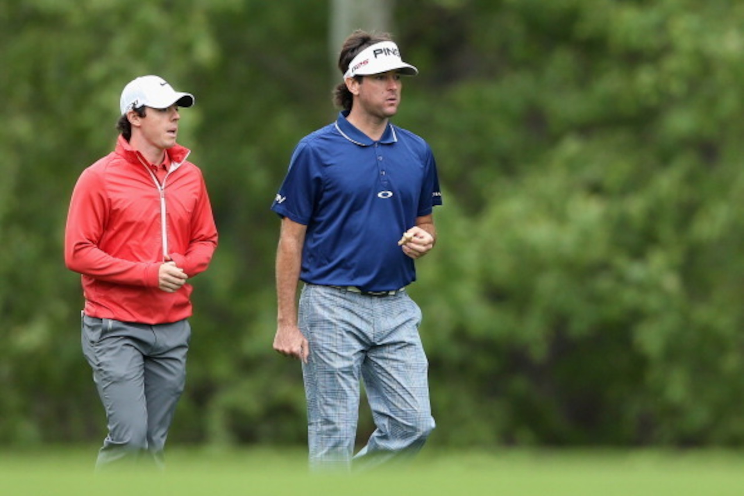 CHARLOTTE, NC - MAY 02: Rory McIlroy of Northern Ireland walks down the 9th fairway with Bubba Watson during the first round of the Wells Fargo Championship at Quail Hollow Club on May 2, 2013 in Charlotte, North Carolina. (Photo by Streeter Lecka/Getty CHARLOTTE, NC - MAY 02: Rory McIlroy of Northern Ireland walks down the 9th fairway with Bubba Watson during the first round of the Wells Fargo Championship at Quail Hollow Club on May 2, 2013 in Charlotte, North Carolina. (Photo by Streeter Lecka/Getty