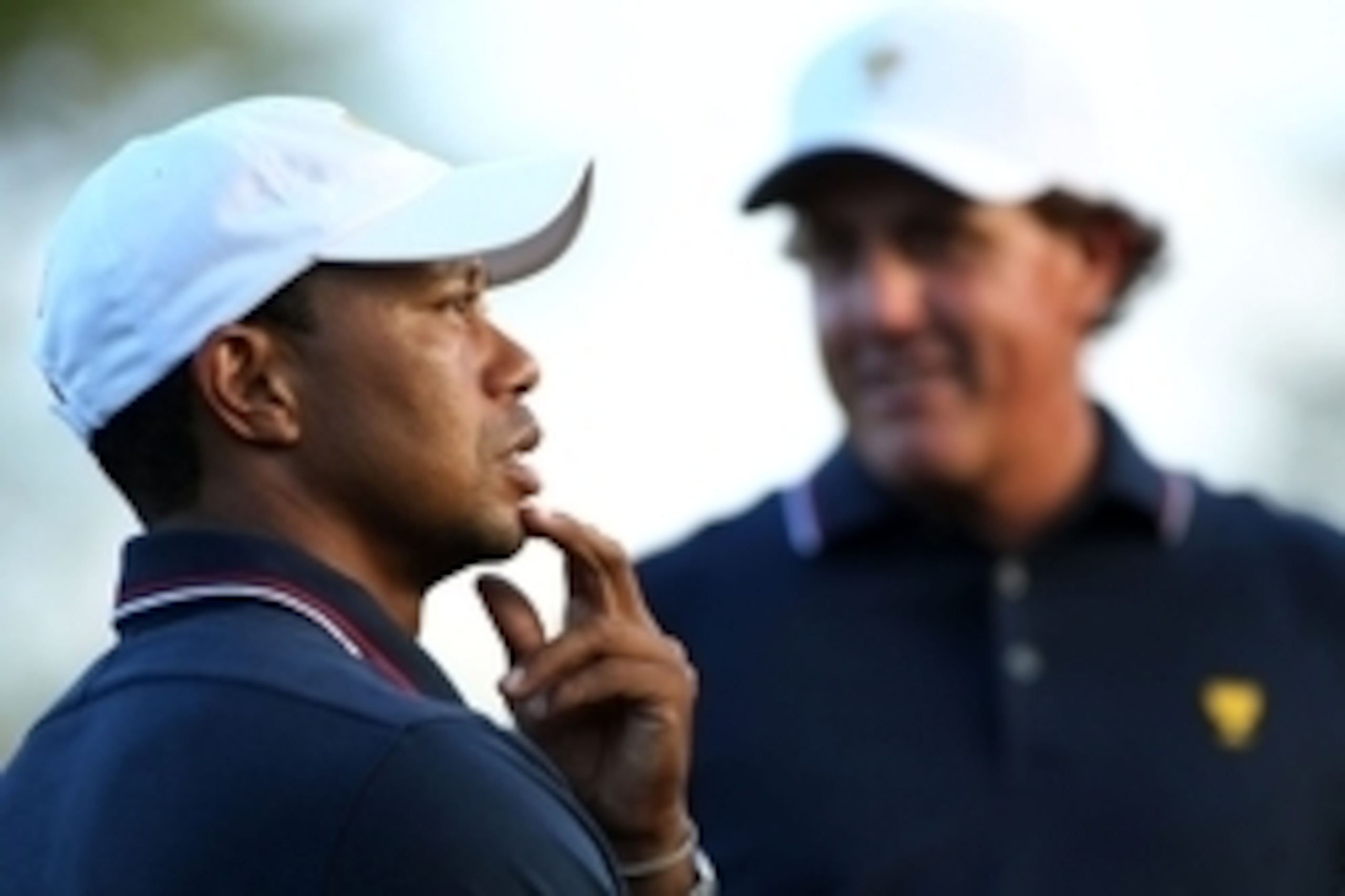 Oct 3, 2013; Dublin, OH, USA; Tiger Woods and Phil Mickelson wait on the 17th green during the Thursday four ball matches of the Presidents Cup at Muirfield Village Golf Club. Mandatory Credit: Peter Casey-USA TODAY Sports Oct 3, 2013; Dublin, OH, USA; Tiger Woods and Phil Mickelson wait on the 17th green during the Thursday four ball matches of the Presidents Cup at Muirfield Village Golf Club. Mandatory Credit: Peter Casey-USA TODAY Sports