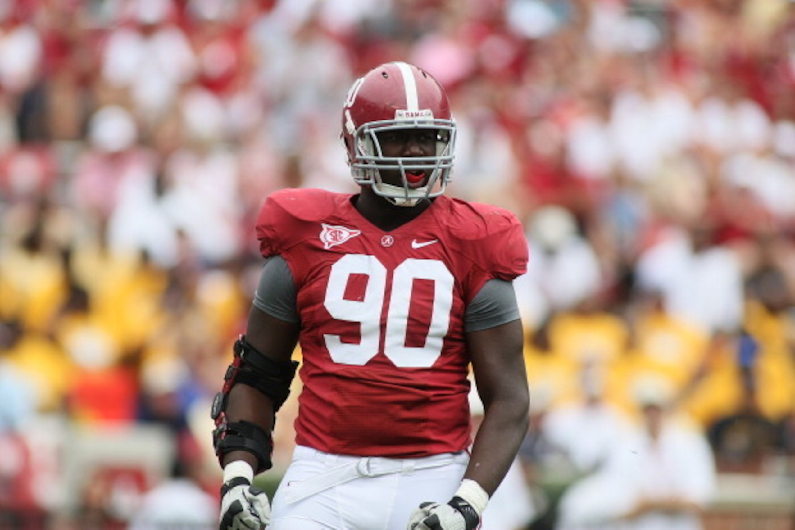 TUSCALOOSA, AL - SEPTEMBER 3:  Defensive lineman Quinton Dial #90 of the Alabama Crimson Tide during the game with the Kent State Golden Flashes on September 3, 2011 at Bryant Denny Stadium in Tuscaloosa, Alabama.  Alabama defeated Kent State 48-7.  (Phot