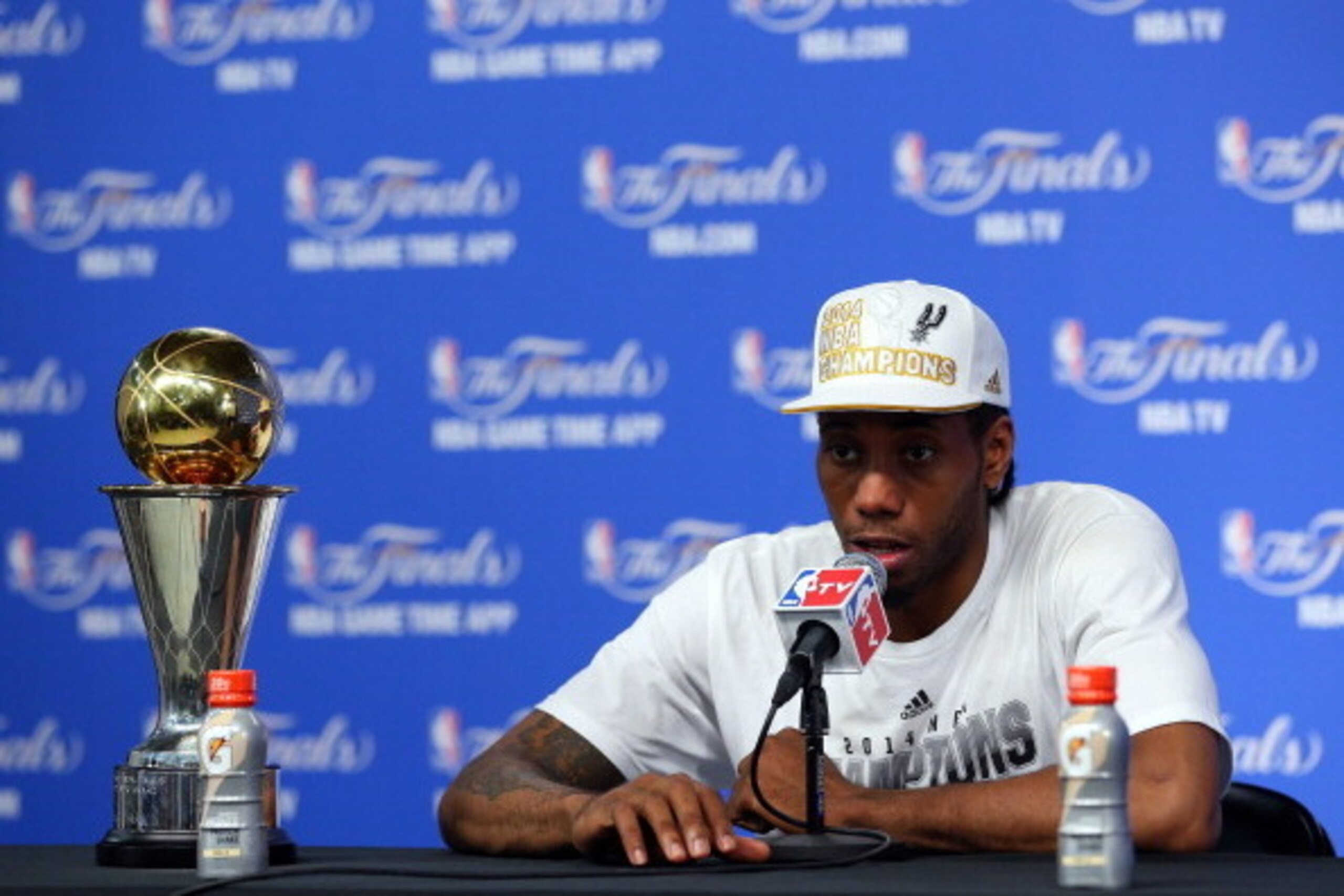 SAN ANTONIO, TX - JUNE 15:  Finals MVP Kawhi Leonard #2 of the San Antonio Spurs speaks to the media after defeating the Miami Heat in Game Five of the 2014 NBA Finals 104-87 at the AT&T Center on June 15, 2014 in San Antonio, Texas. NOTE TO USER: User ex