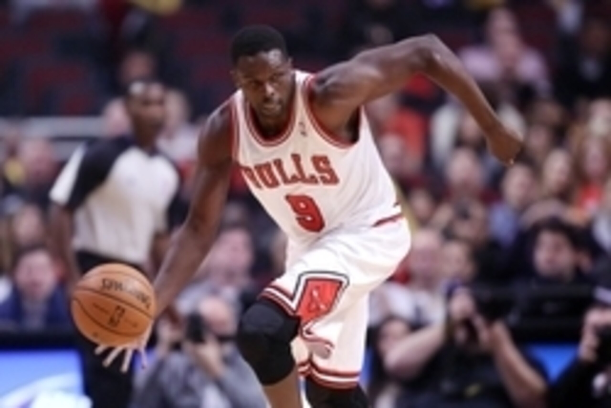 Dec 31, 2013; Chicago, IL, USA; Chicago Bulls player Luol Deng with the ball during the first quarter against the Toronto Raptors at the United Center. Mandatory Credit: Dennis Wierzbicki-USA TODAY Sports