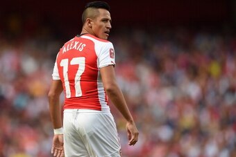 LONDON, ENGLAND - AUGUST 03:  Alexis Sanchez of Arsenal looks on during the Emirates Cup match between Arsenal and AS Monaco at the Emirates Stadium on August 3, 2014 in London, England.  (Photo by Michael Regan/Getty Images)