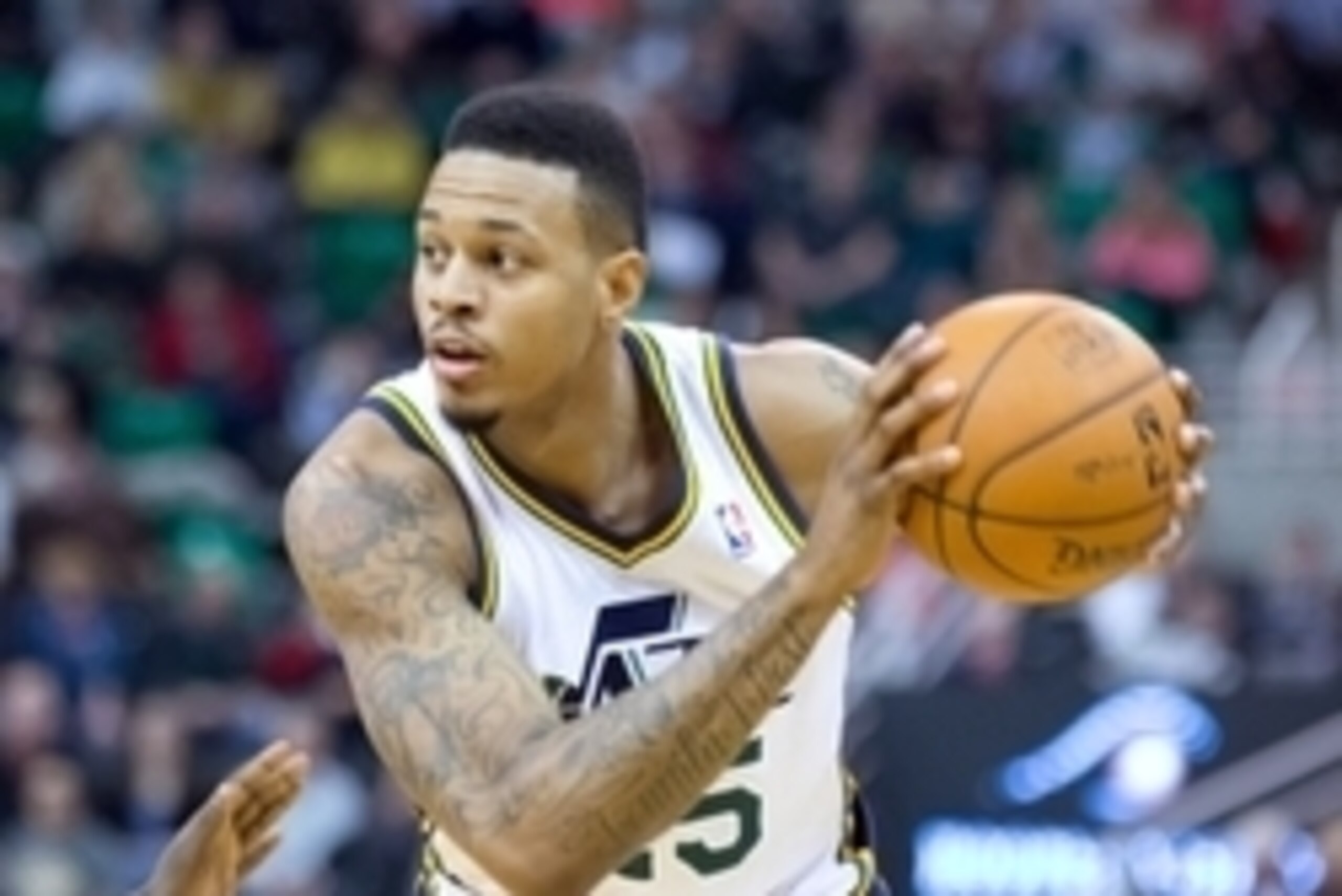 Jan 10, 2014; Salt Lake City, UT, USA; Utah Jazz shooting guard Brandon Rush (25) controls the ball during the second half against the Cleveland Cavaliers at EnergySolutions Arena. The Cavaliers won 113-102. Mandatory Credit: Russ Isabella-USA TODAY Sport