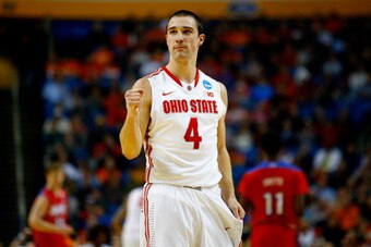 BUFFALO, NY - MARCH 20: Aaron Craft #4 of the Ohio State Buckeyes reacts against the Dayton Flyers during the second round of the 2014 NCAA Men's Basketball Tournament at the First Niagara Center on March 20, 2014 in Buffalo, New York.  (Photo by Jared Wi