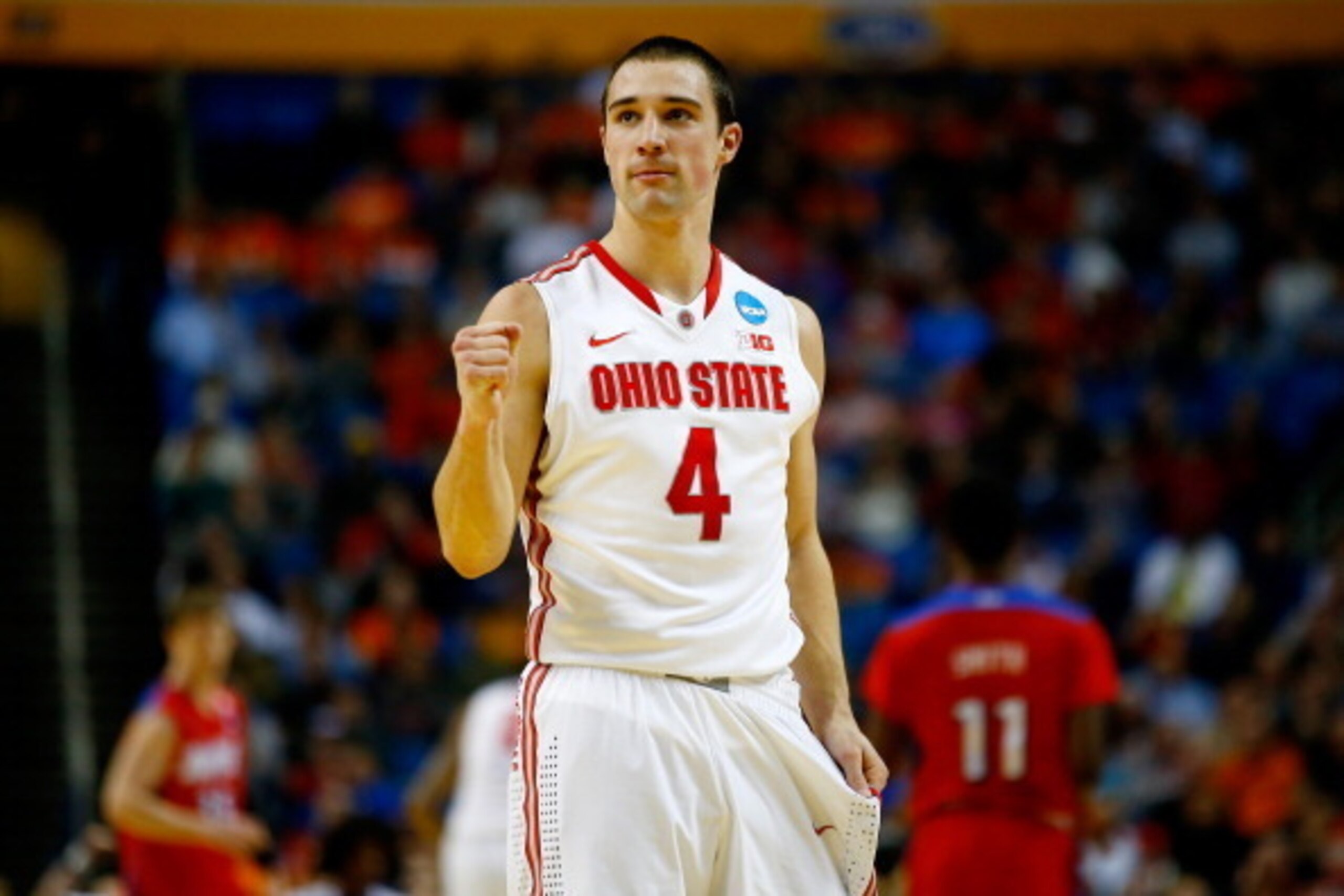 BUFFALO, NY - MARCH 20: Aaron Craft #4 of the Ohio State Buckeyes reacts against the Dayton Flyers during the second round of the 2014 NCAA Men's Basketball Tournament at the First Niagara Center on March 20, 2014 in Buffalo, New York.  (Photo by Jared Wi