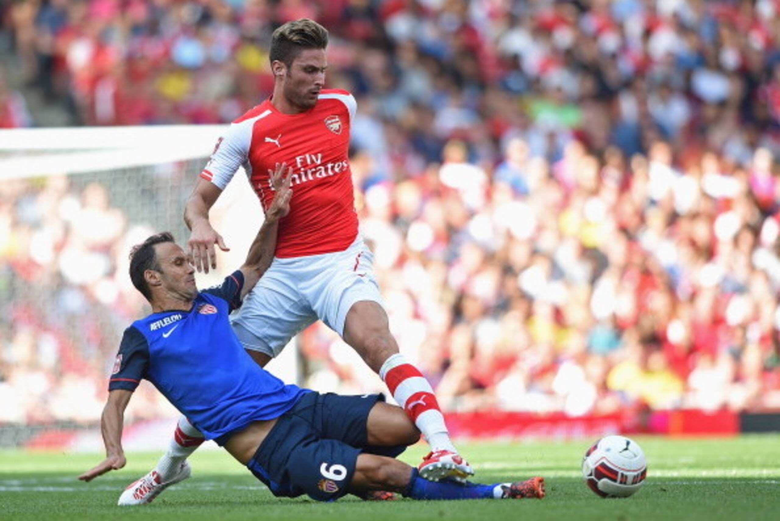 LONDON, ENGLAND - AUGUST 03: Ricardo Carvalho of Monaco and Olivier Giroud of Arsenal in action during the Emirates Cup match between Arsenal and AS Monaco at the Emirates Stadium on August 3, 2014 in London, England.  (Photo by Michael Regan/Getty Images