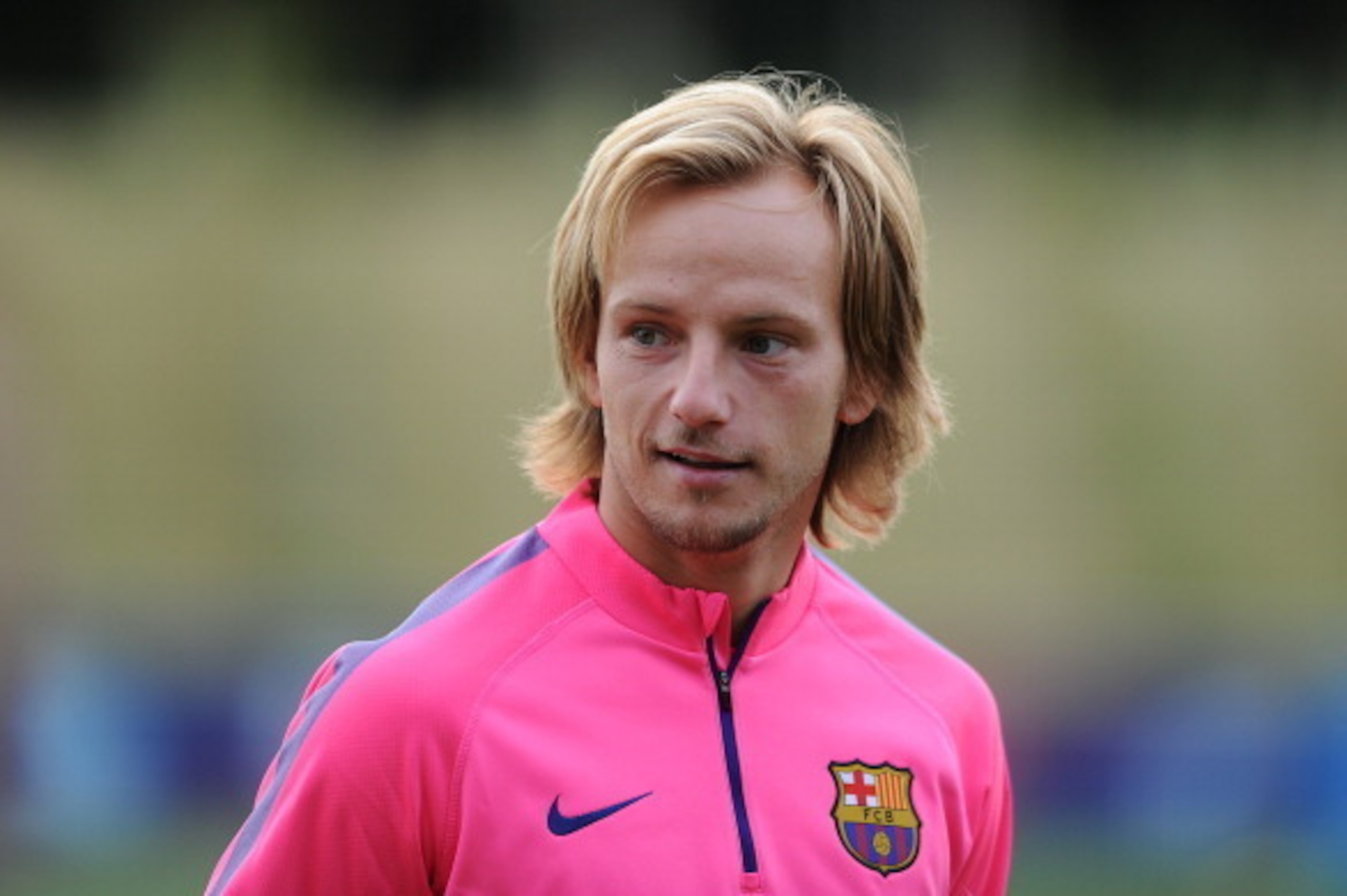 BURTON-UPON-TRENT, ENGLAND - JULY 28: Ivan Rakitic of Barcelona looks on during the Barcelona Training Session at St George's Park on July 28, 2014 in Burton-upon-Trent, England. (Photo by Chris Brunskill/Getty Images)