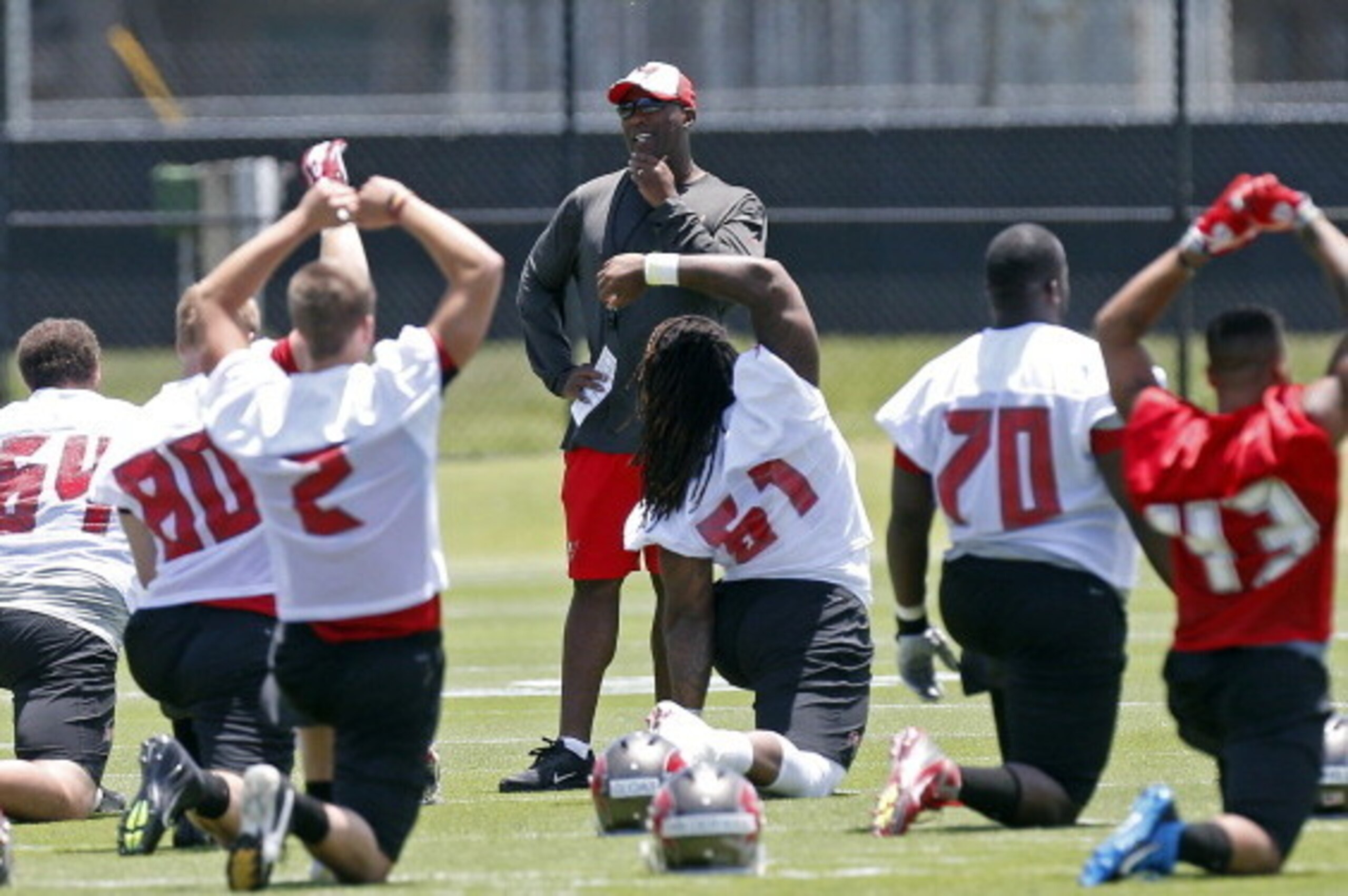 TAMPA, FL - MAY 16: Head Coach Lovie Smith of the Tampa Bay Buccaneers looks on during workouts during the first day of rookie minicamp on May 16, 2014 at One Buc Place in Tampa, Florida. (Photo by Brian Blanco/Getty Images) TAMPA, FL - MAY 16: Head Coach Lovie Smith of the Tampa Bay Buccaneers looks on during workouts during the first day of rookie minicamp on May 16, 2014 at One Buc Place in Tampa, Florida. (Photo by Brian Blanco/Getty Images)