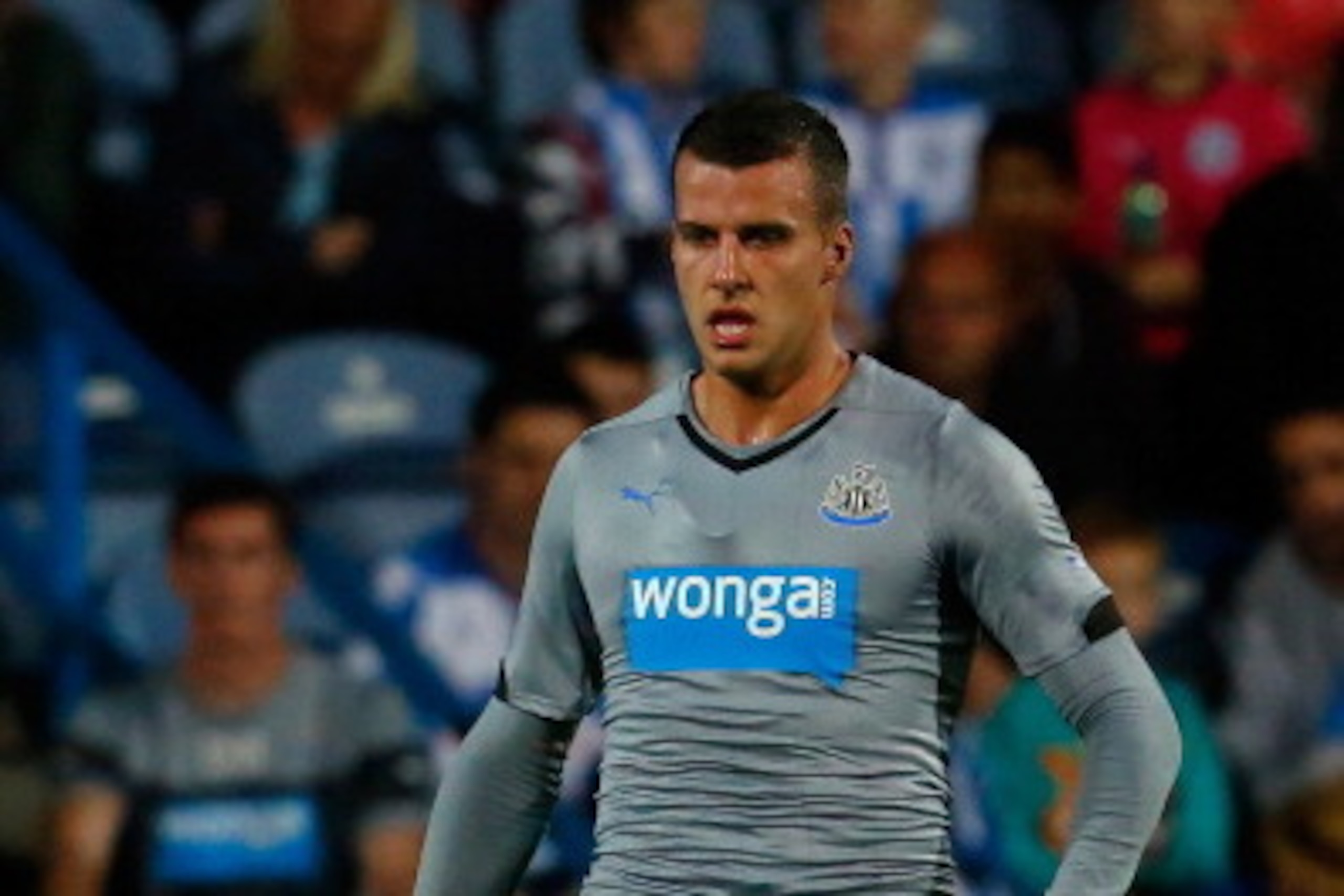 HUDDERSFIELD, ENGLAND - AUGUST 5: Steven Taylor of Newcastle in action during the Pre Season Friendly match between Huddersfield Town and Newcastle United at the John Smith's Stadium on August 5, 2014 in Huddersfield, England. (Photo by Paul Thomas/Getty 