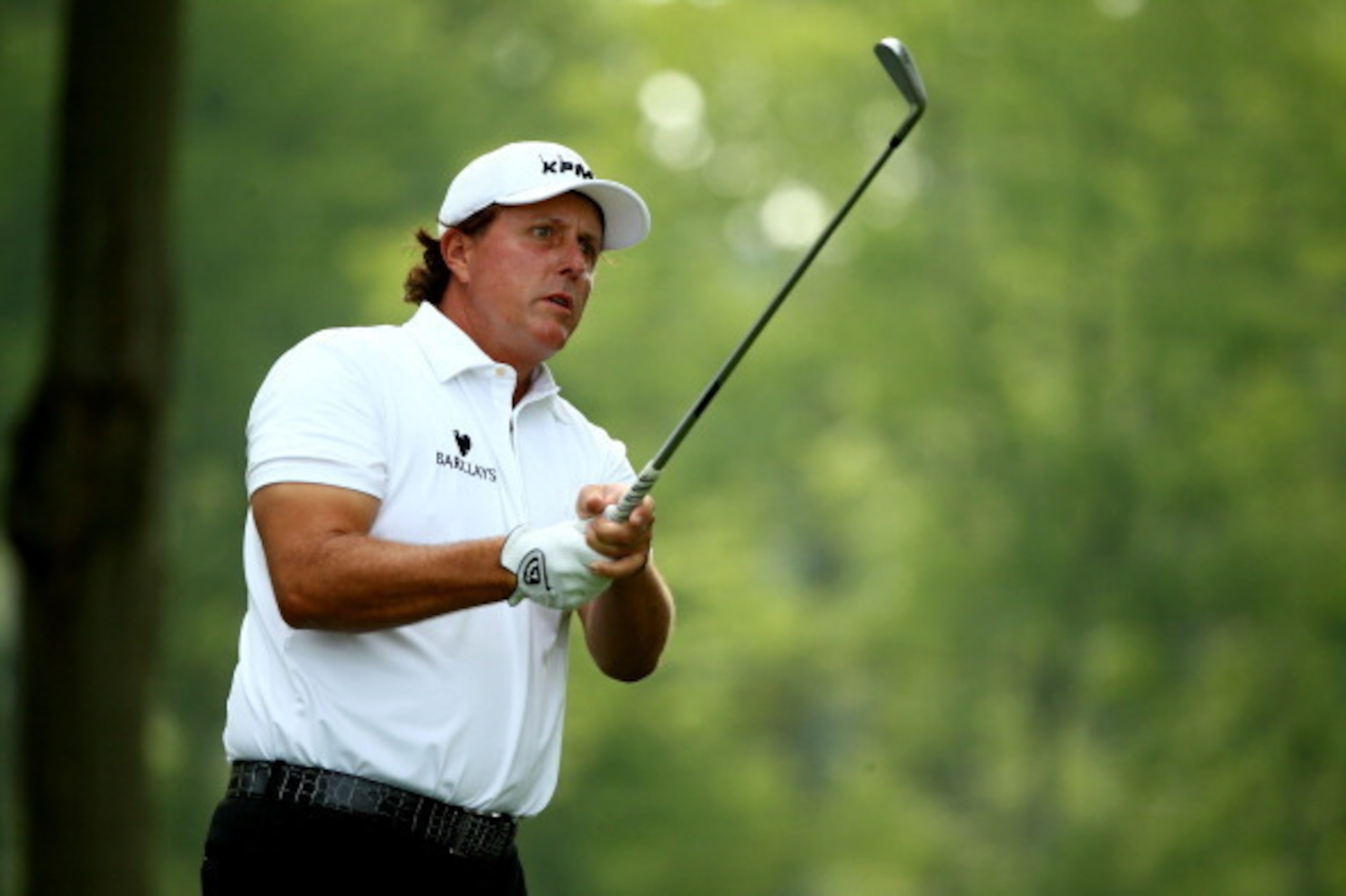 LOUISVILLE, KY - AUGUST 07:  Phil Mickelson of the United States hits his tee shot on the 12th hole during the first round of the 96th PGA Championship at Valhalla Golf Club on August 7, 2014 in Louisville, Kentucky.  (Photo by Andy Lyons/Getty Images)