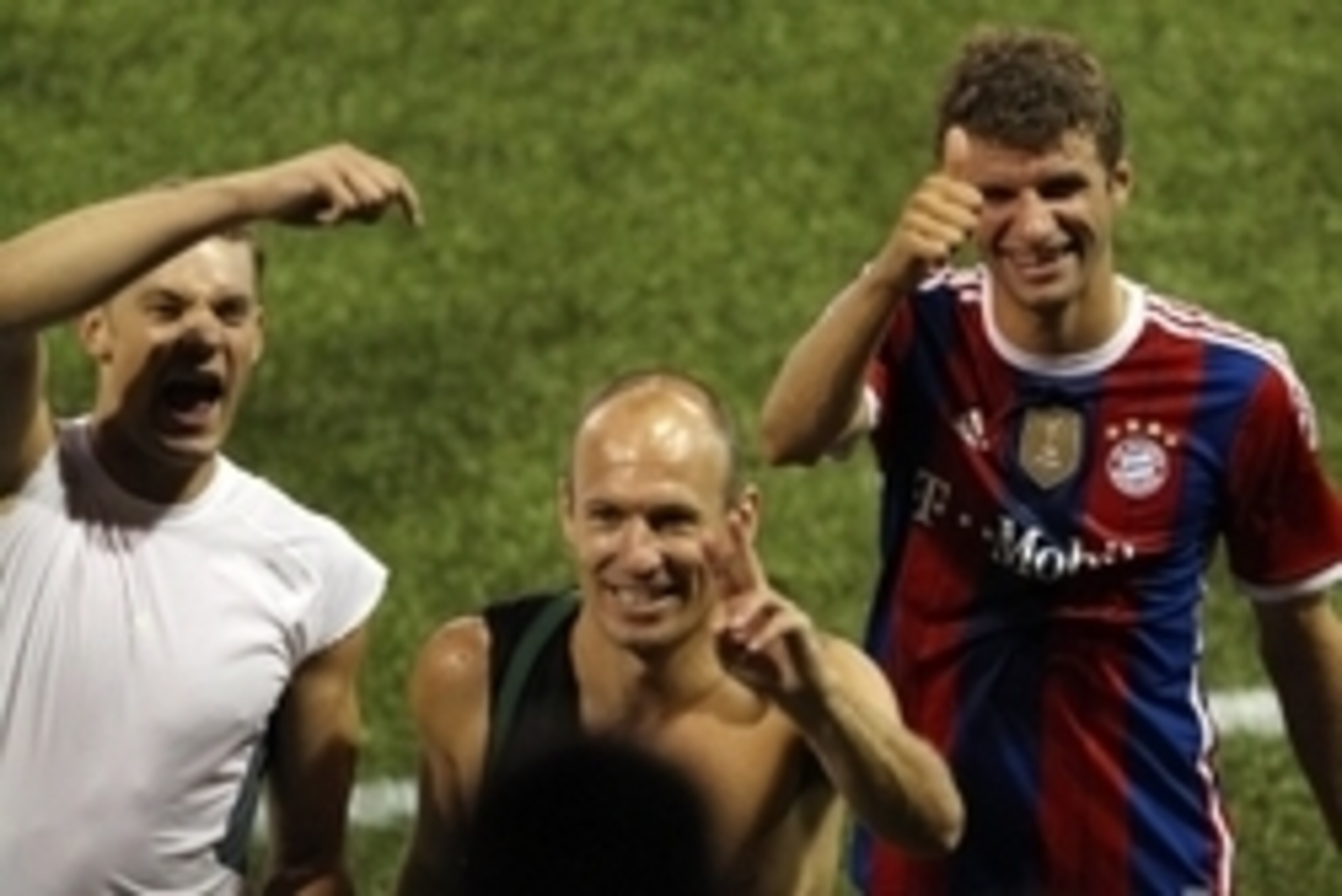 Aug 6, 2014; Portland, OR, USA; Bayern Munich players Manuel Neuer (left) , Arjen Robben (middle) and Thomas Muller (right) wave to the crowd after the 2014 MLS All Star Game at Providence Park. Mandatory Credit: Jaime Valdez-USA TODAY Sports