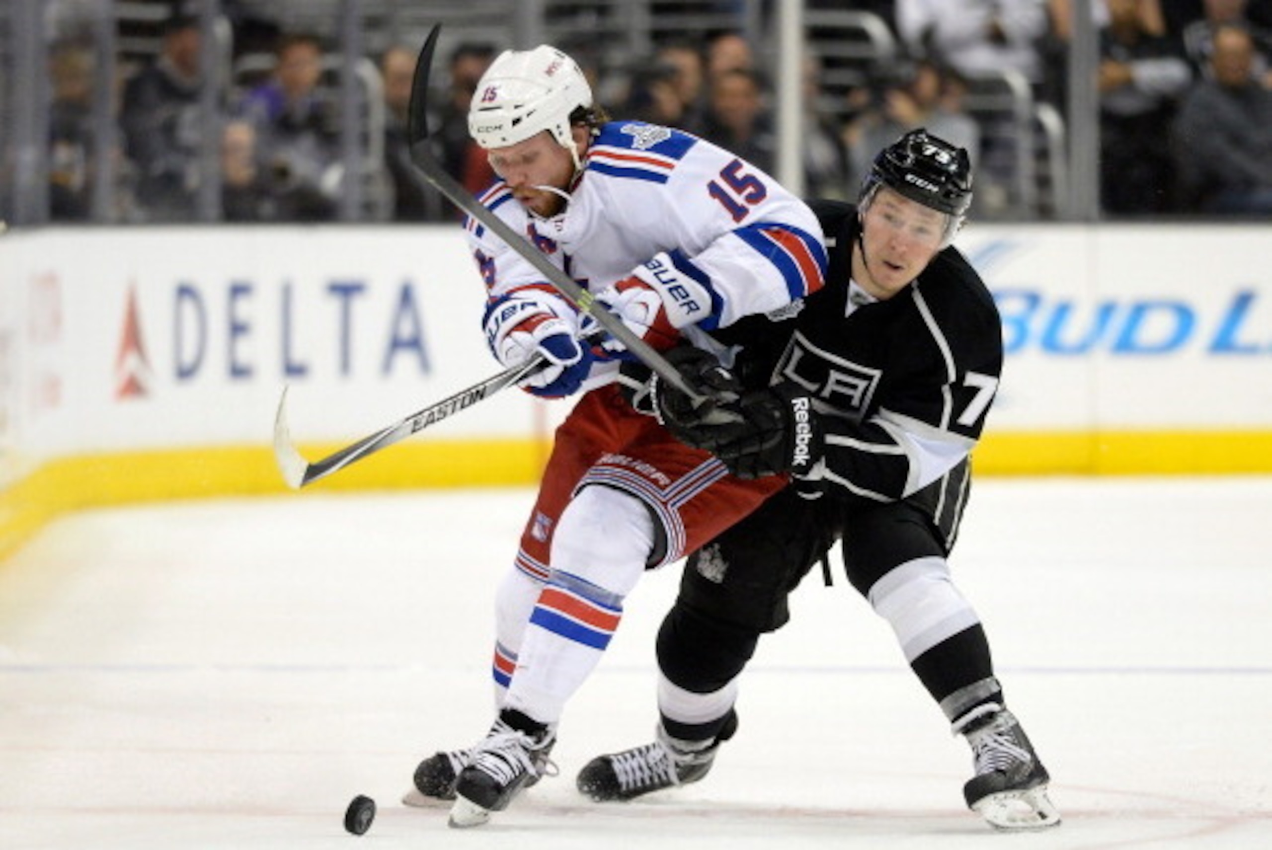LOS ANGELES, CA - JUNE 07:  Derek Dorsett #15 of the New York Rangers and Tyler Toffoli #73 of the Los Angeles Kings go for the puck in the third period during Game Two of the 2014 NHL Stanley Cup Final at the Staples Center on June 7, 2014 in Los Angeles