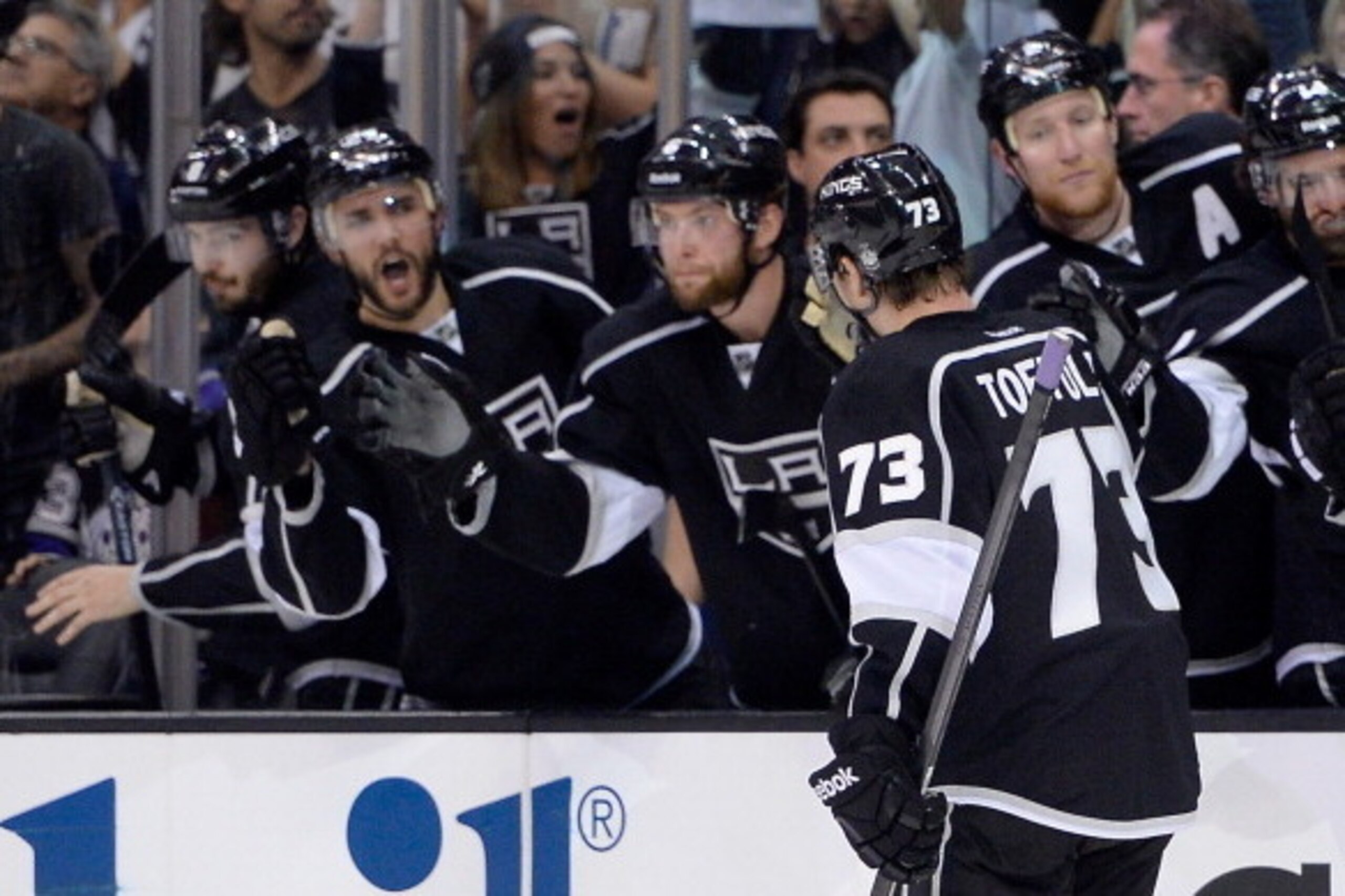 LOS ANGELES, CA - MAY 24:  Tyler Toffoli #73 of the Los Angeles Kings celebrates with teammates after scoring a second period goal against the Chicago Blackhawks in Game Three of the Western Conference Final during the 2014 Stanley Cup Playoffs at Staples