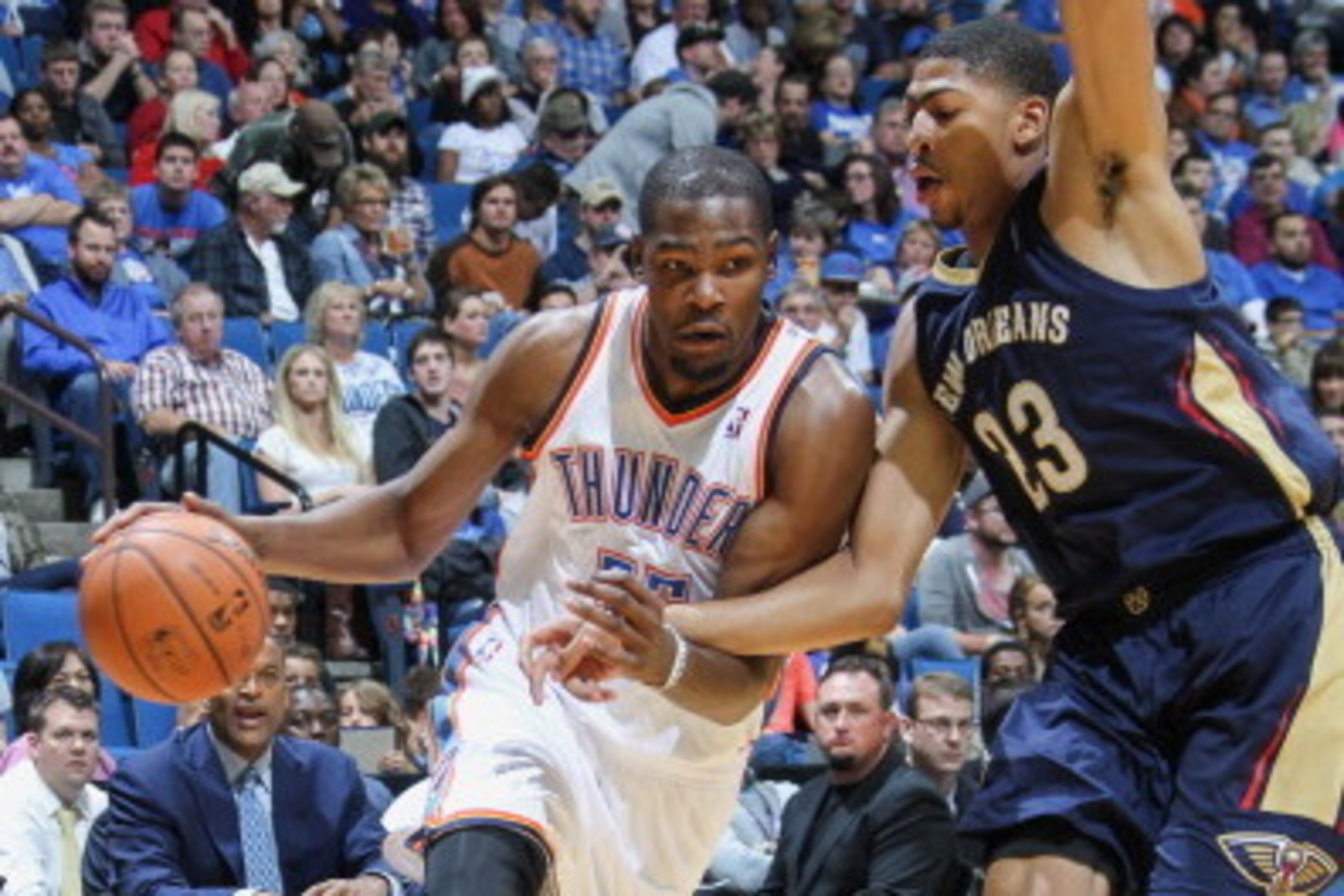 TULSA, OK - OCTOBER 17: Kevin Durant #35 of the Oklahoma City Thunder drives to the basket against Anthony Davis #23 of the New Orleans Pelicans on October 17, 2013 at the BOK Center in Tulsa, Oklahoma. NOTE TO USER: User expressly acknowledges and agree TULSA, OK - OCTOBER 17: Kevin Durant #35 of the Oklahoma City Thunder drives to the basket against Anthony Davis #23 of the New Orleans Pelicans on October 17, 2013 at the BOK Center in Tulsa, Oklahoma. NOTE TO USER: User expressly acknowledges and agree