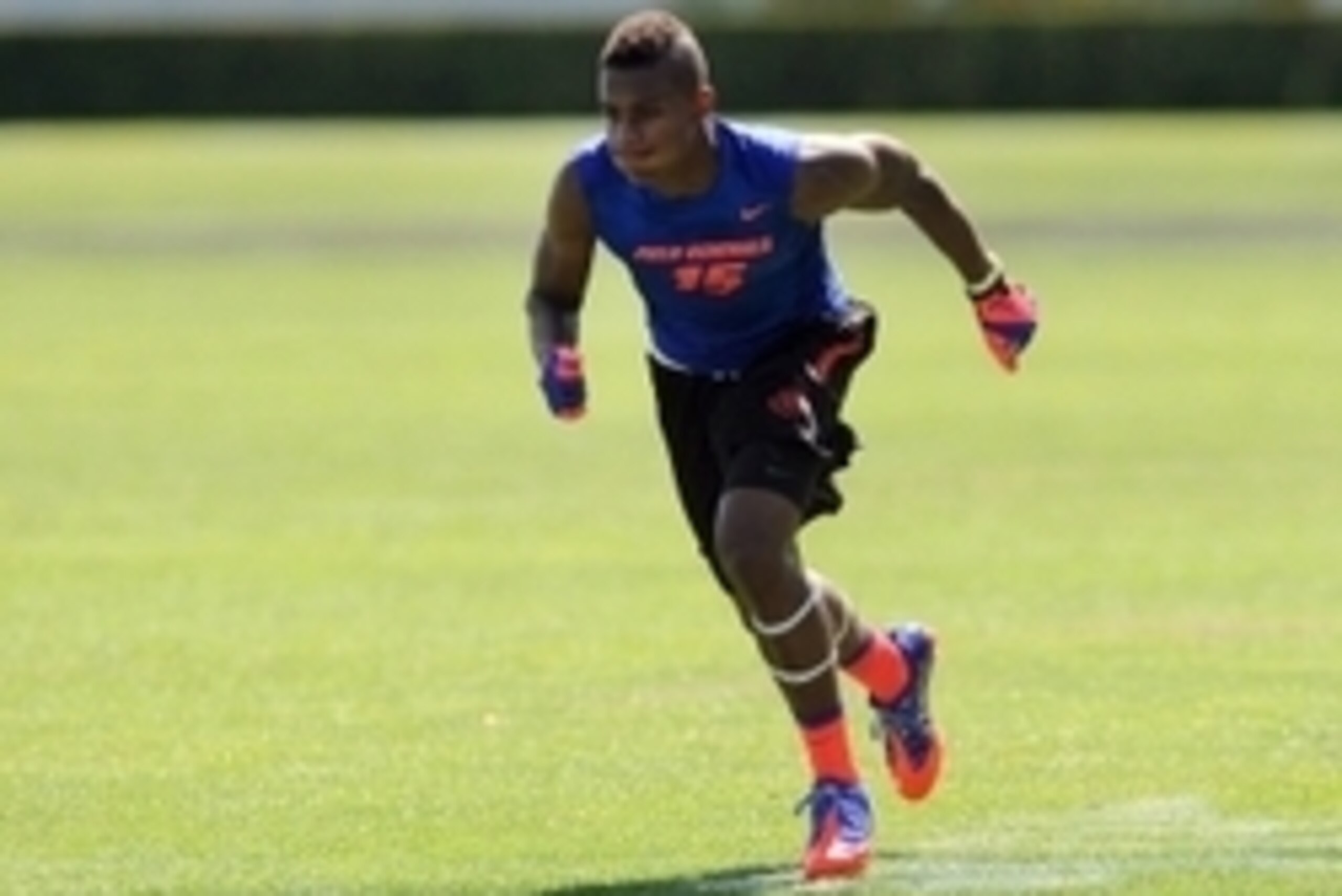 Jul 2, 2013; Beaverton, OR, USA; Wide receiver Malachi Dupre (15) runs a pass route during the Nike 7on7 pool play at Nike World Headquarters in Beaverton, Oregon on Tuesday July, 2, 2013. Mandatory Credit: Steve Dykes-USA TODAY Sports