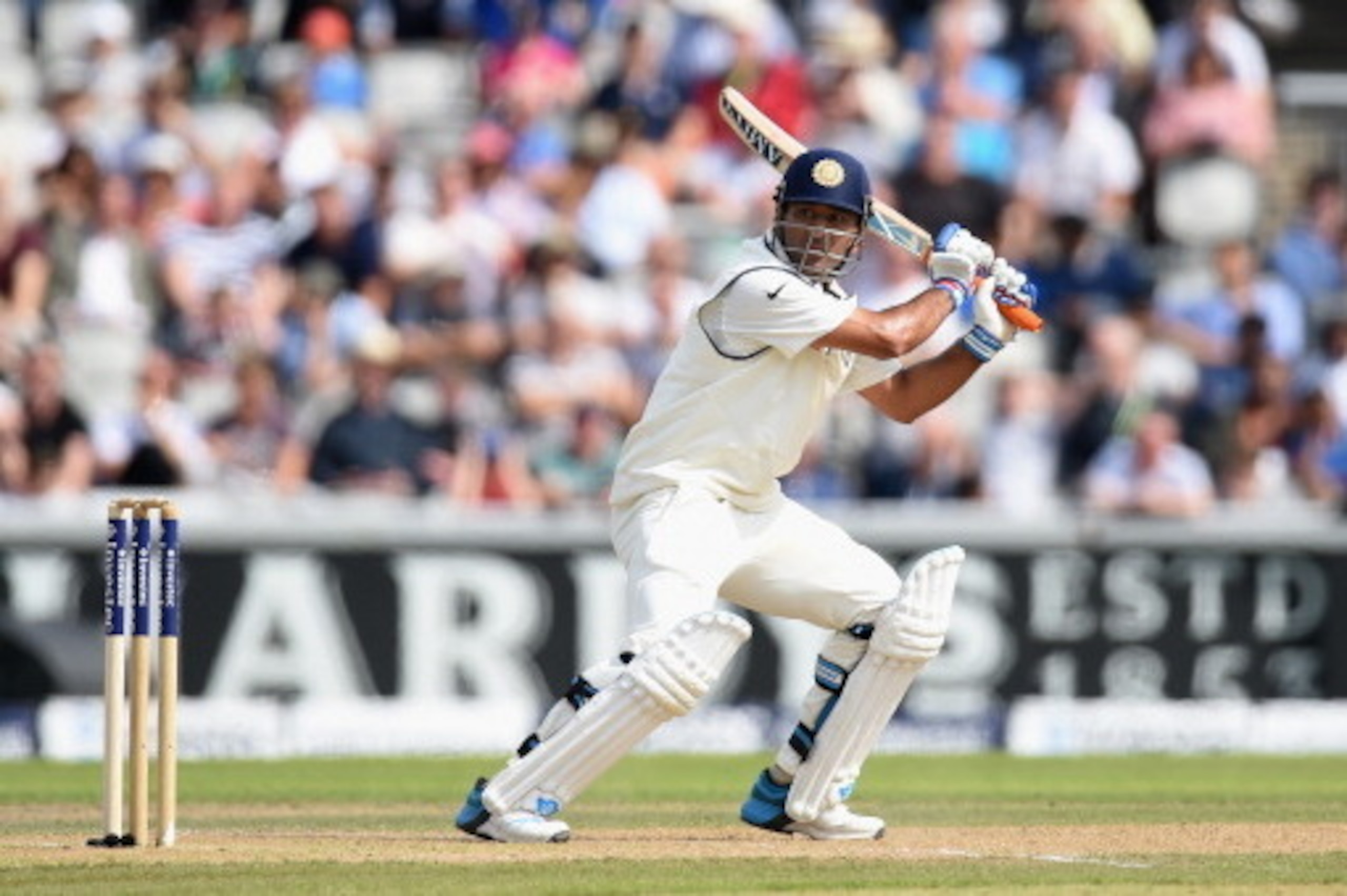 MANCHESTER, ENGLAND - AUGUST 07:  India batsman MS Dhoni picks up some runs during day one of the 4th Investec Test match between England and India at Old Trafford on August 7, 2014 in Manchester, England.  (Photo by Stu Forster/Getty Images)