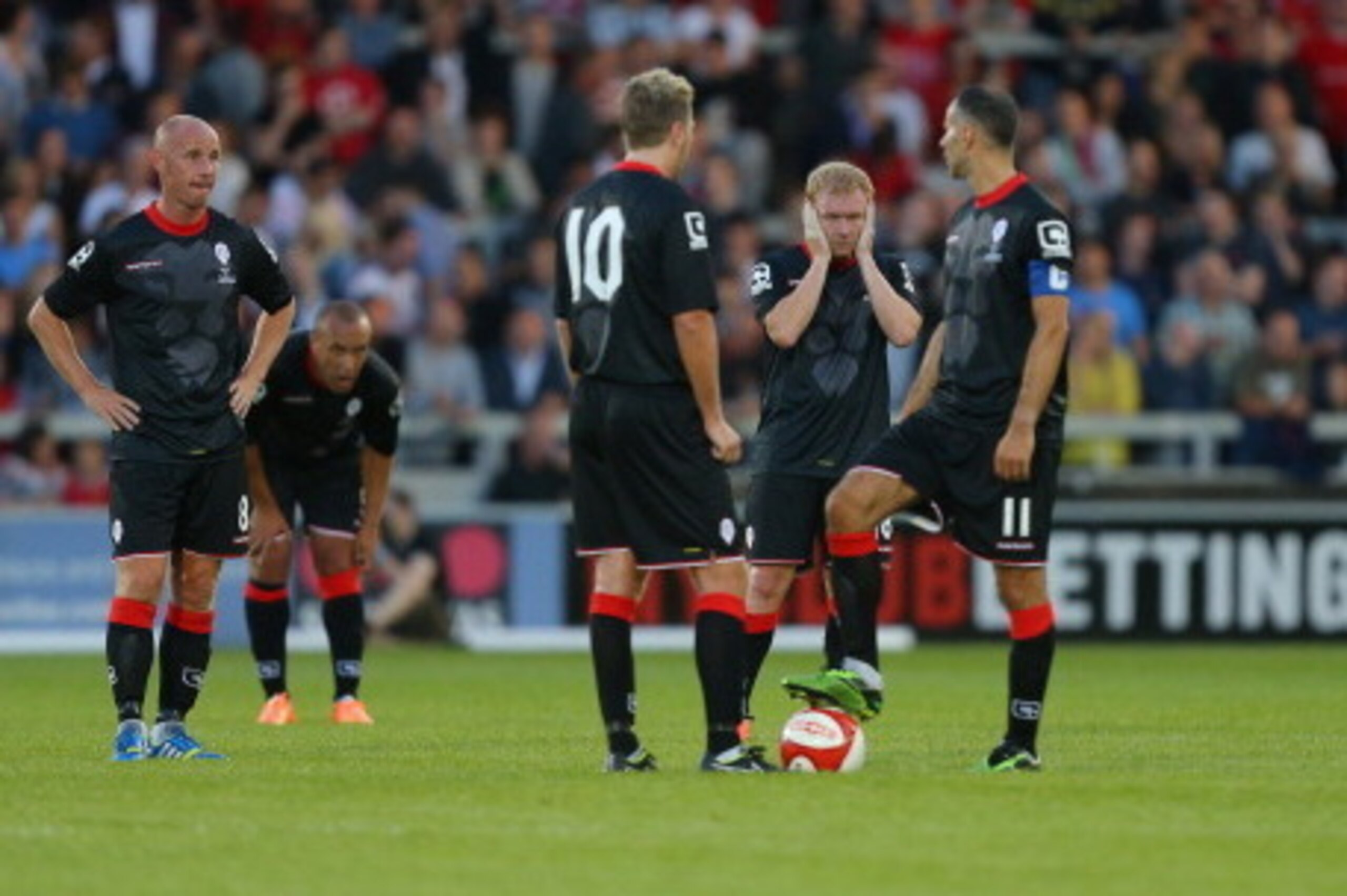SALFORD, ENGLAND - AUGUST 07: Paul Scholes, centre, stands dejected after the Class of 92 XI went 0-2 down during the match between Salford City and the Class of '92 XI at AJ Bell Stadium on August 7, 2014 in Salford, England.  (Photo by Dave Thompson/Get