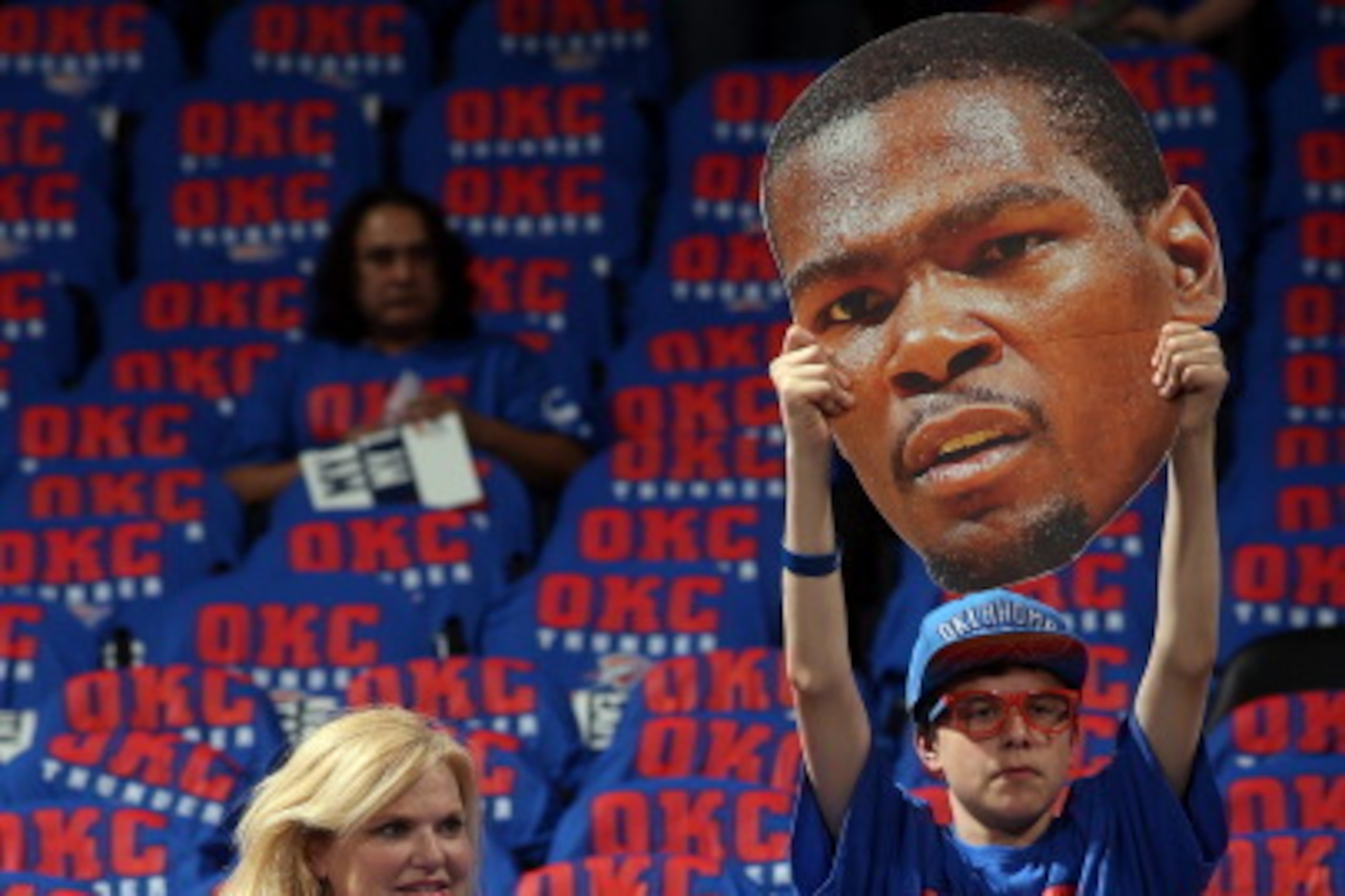 OKLAHOMA CITY, OK - MAY 3: Fans hold up signs of Kevin Durant #35 of the Oklahoma City Thunder before against the Memphis Grizzlies in Game Seven of the Western Conference Quarterfinals during the 2014 NBA Playoffs on May 3, 2014 at the Chesapeake Energy 