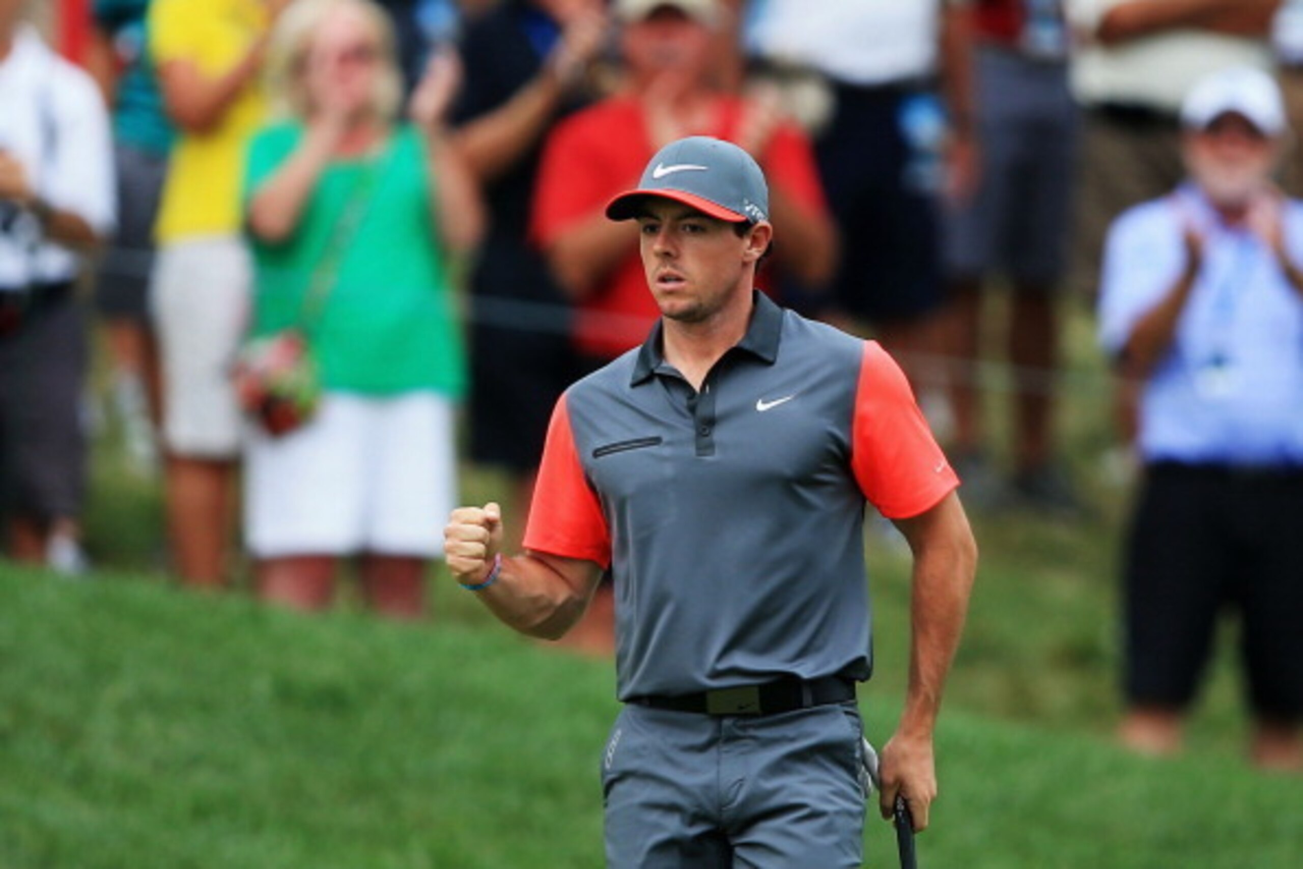 LOUISVILLE, KY - AUGUST 07:  Rory McIlroy of Northern Ireland celebrates a putt for birdie on the 14th hole during the first round of the 96th PGA Championship at Valhalla Golf Club on August 7, 2014 in Louisville, Kentucky.  (Photo by David Cannon/Getty 