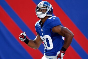 EAST RUTHERFORD, NJ - SEPTEMBER 16:  Victor Cruz #80 of the New York Giants celebrates a touchdown with his signature salsa dance during a game against the Tampa Bay Buccaneers at MetLife Stadium on September 16, 2012 in East Rutherford, New Jersey.  (Pho
