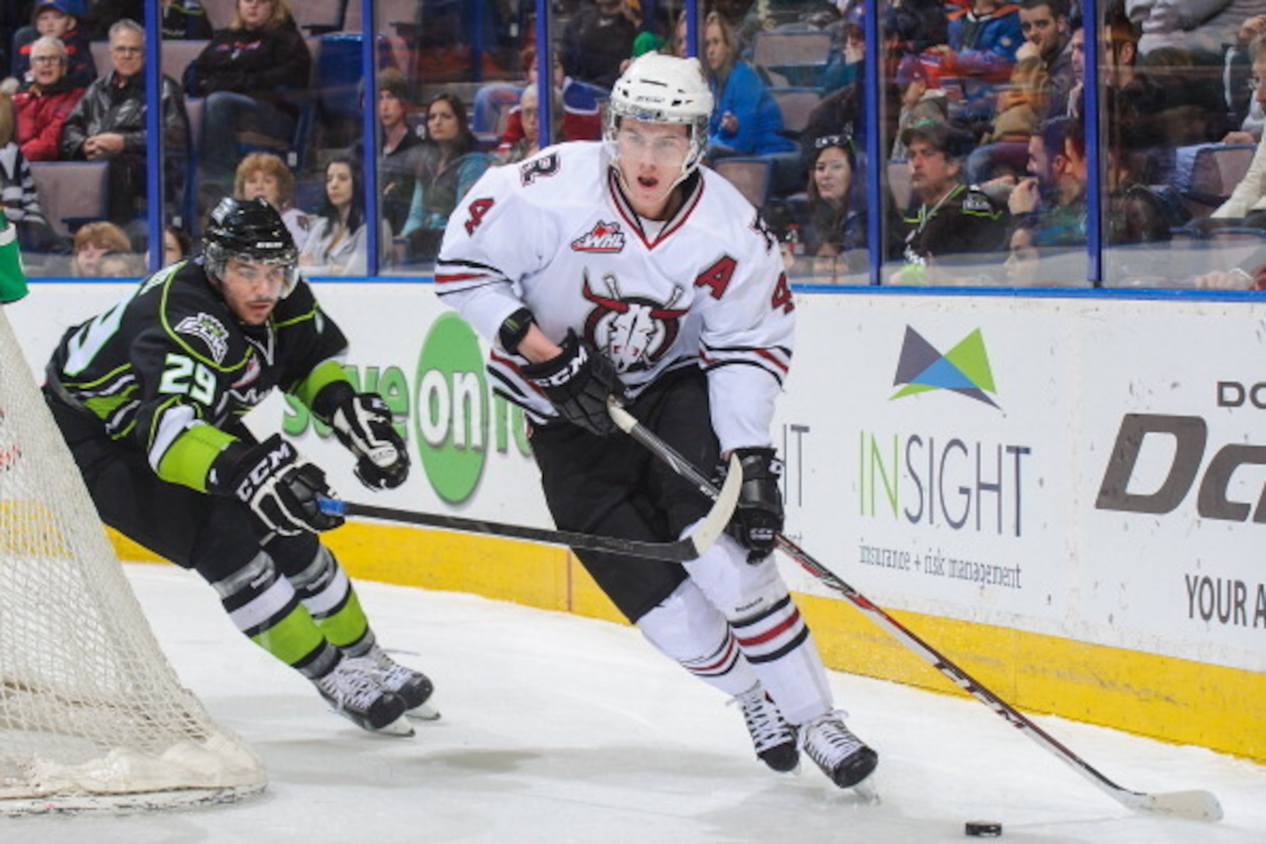 EDMONTON, AB - MARCH 16: Mitchell Moroz #29 of the Edmonton Oil Kings chases Haydn Fleury #4 of the Red Deer Rebels during a WHL game at Rexall Place on March 16, 2014 in Edmonton, Alberta, Canada. (Photo by Derek Leung/Getty Images)