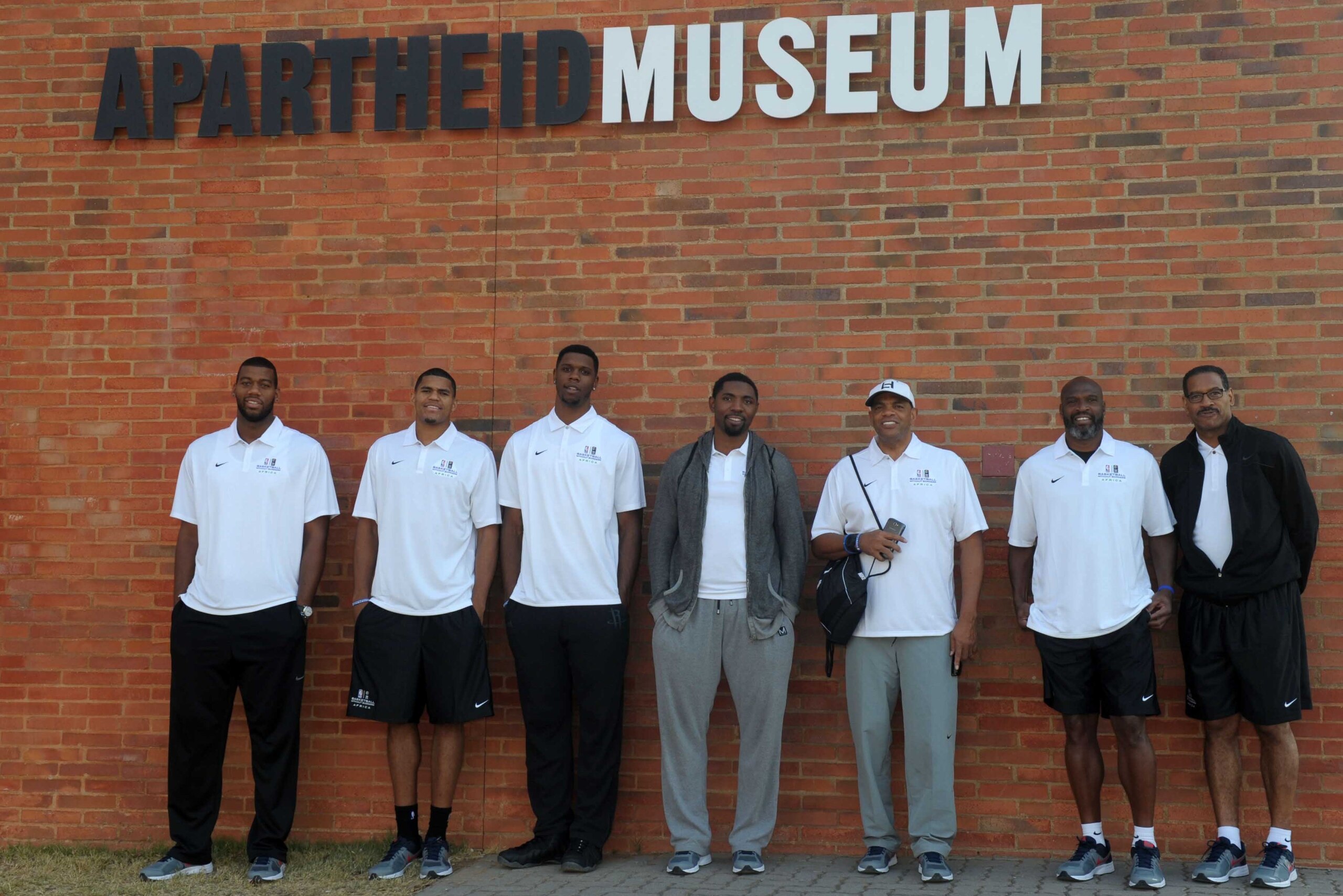 Lionel Hollins (third from right) visited the Apartheid Museum in Johannesburg with fellow NBA coaches and players.