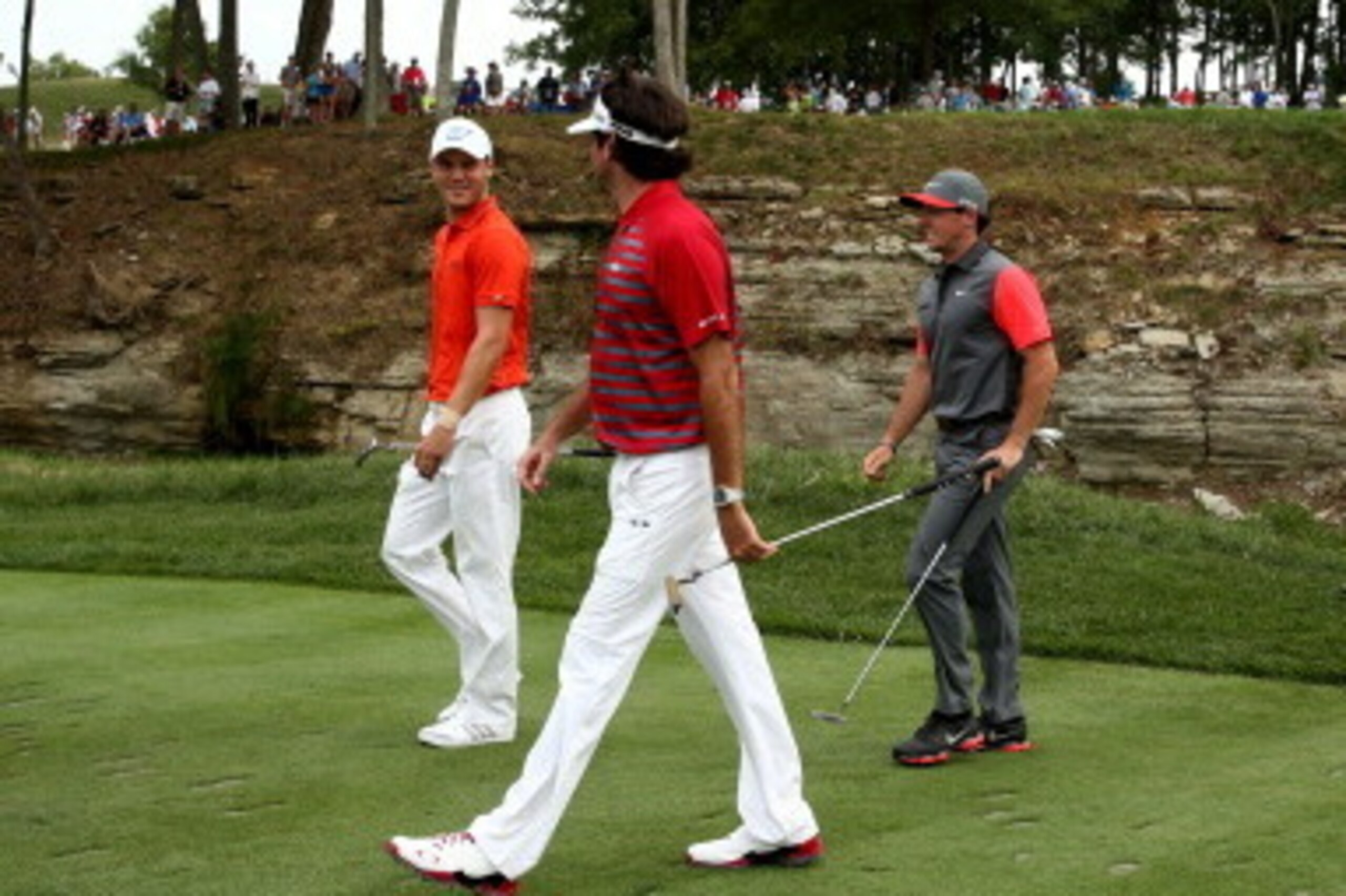 LOUISVILLE, KY - AUGUST 07:  Bubba Watson of the United States, Martin Kaymer of Germany and Rory McIlroy of Northern Ireland walk off the 14th tee during the first round of the 96th PGA Championship at Valhalla Golf Club on August 7, 2014 in Louisville, 