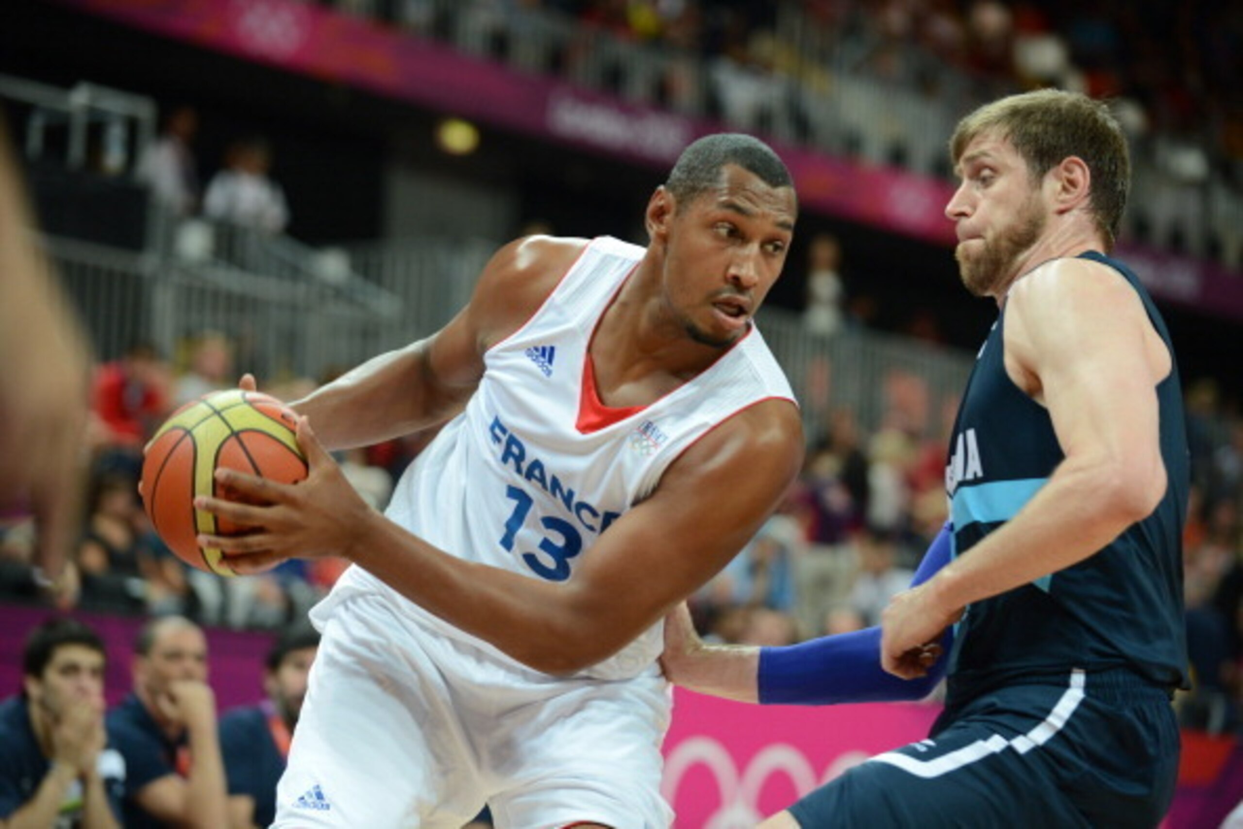 LONDON, ENGLAND - JULY 31: Boris Diaw #13 of France drives versus Argentina during their Basketball Game on Day 4 of the London 2012 Olympic Games at the Olympic Park Basketball Arena on July 31, 2012 in London, England. NOTE TO USER: User expressly ackno LONDON, ENGLAND - JULY 31: Boris Diaw #13 of France drives versus Argentina during their Basketball Game on Day 4 of the London 2012 Olympic Games at the Olympic Park Basketball Arena on July 31, 2012 in London, England. NOTE TO USER: User expressly ackno