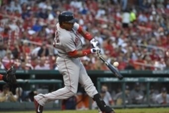 Aug 7, 2014; St. Louis, MO, USA;  Boston Red Sox left fielder Yoenis Cespedes (52) breaks his bat on a single against the St. Louis Cardinals at Busch Stadium. Mandatory Credit: Jasen Vinlove-USA TODAY Sports