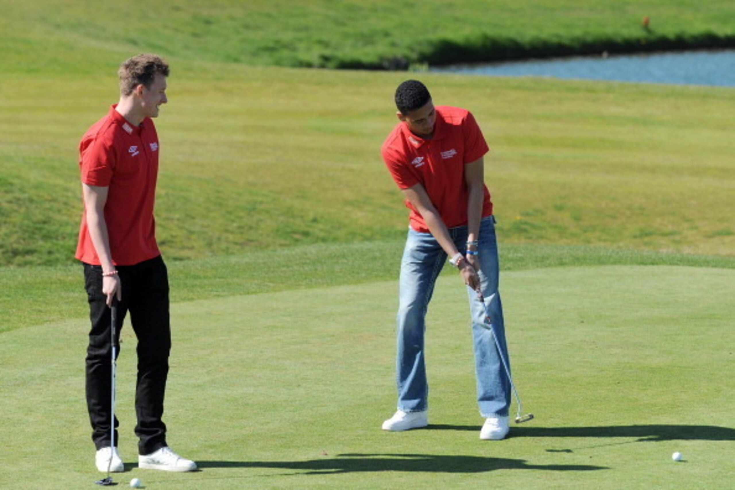 CARDEN PARK, ENGLAND - APRIL 12: Manchester United team-mates Chris Smalling (R) and Phil Jones take part in the England Footballers Foundation Charity Golf Cup at Carden Park on April 12, 2012 in Cheshire, England. (Photo by Clint Hughes/Getty Images for CARDEN PARK, ENGLAND - APRIL 12: Manchester United team-mates Chris Smalling (R) and Phil Jones take part in the England Footballers Foundation Charity Golf Cup at Carden Park on April 12, 2012 in Cheshire, England. (Photo by Clint Hughes/Getty Images for
