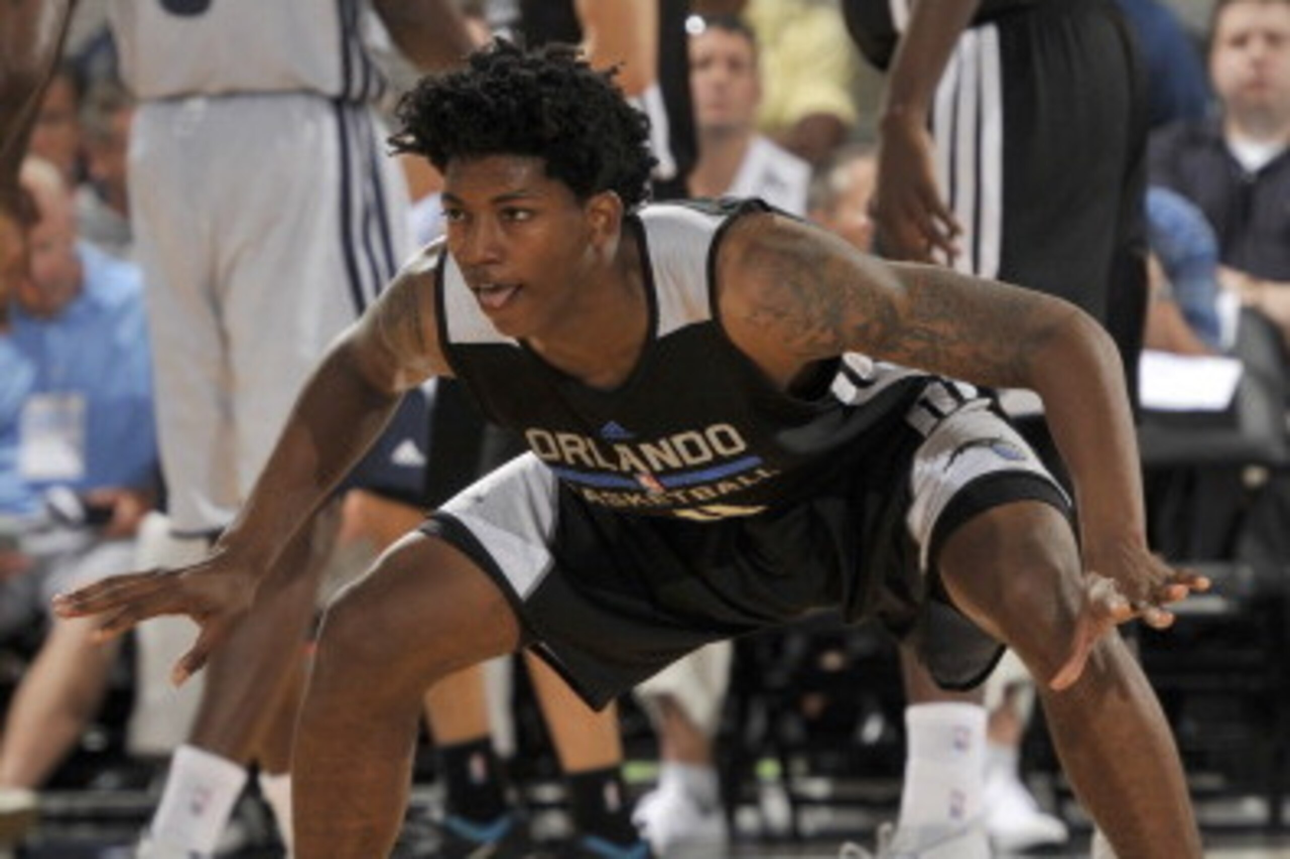 ORLANDO, FL - JULY 8: Elfrid Payton #4 of the Orlando Magic defends against the Memphis Grizzlies during the game during the Samsung NBA Summer League 2014 on July 8, 2014 at Amway Center in Orlando, Florida. NOTE TO USER: User expressly acknowledges and ORLANDO, FL - JULY 8: Elfrid Payton #4 of the Orlando Magic defends against the Memphis Grizzlies during the game during the Samsung NBA Summer League 2014 on July 8, 2014 at Amway Center in Orlando, Florida. NOTE TO USER: User expressly acknowledges and
