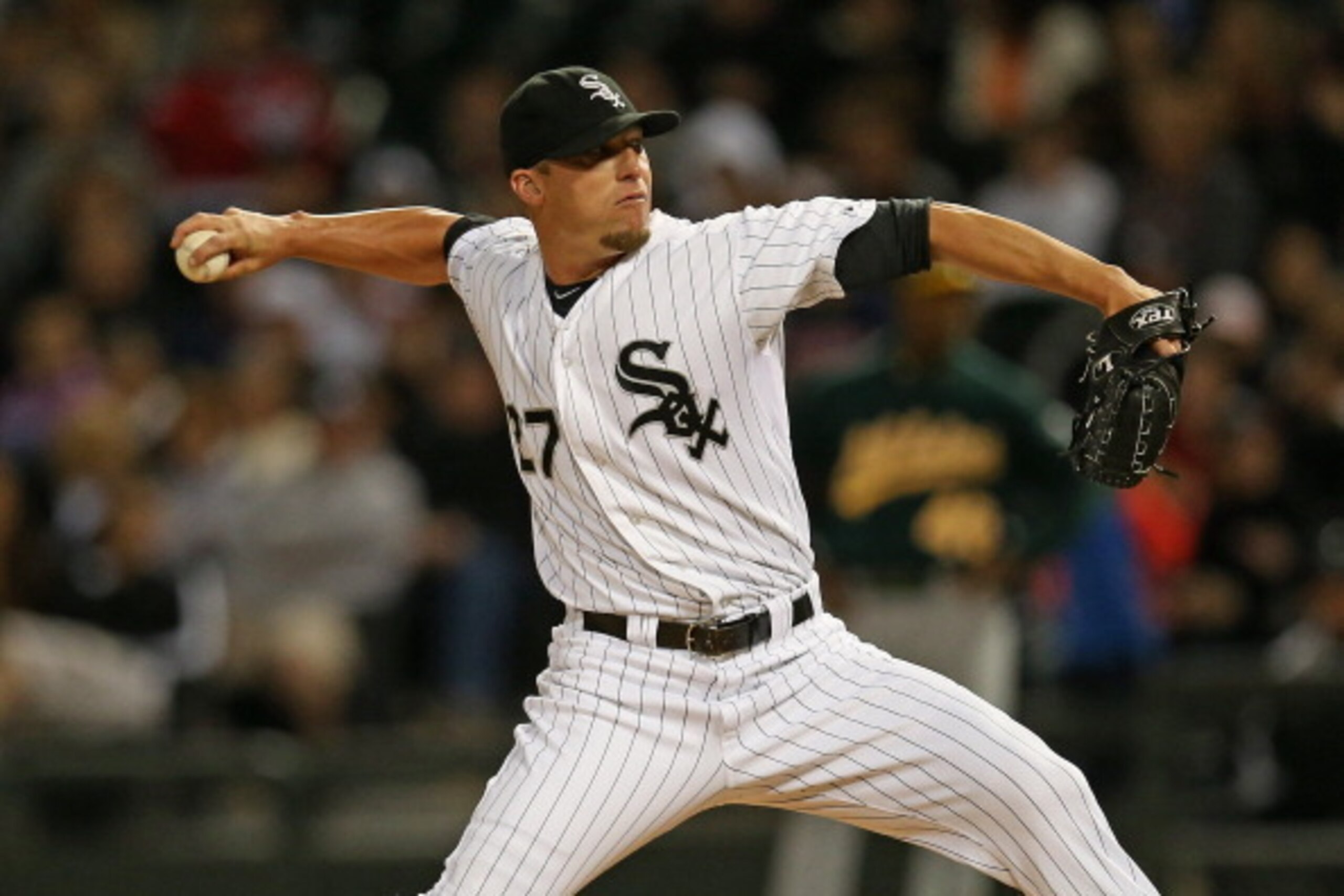 CHICAGO, IL - JUNE 07:  Matt Lindstrom #27 of the Chicago White Sox pitches against the Oakland Athletics at U.S. Cellular Field on June 7, 2013 in Chicago, Illinois. The Athletics defeated the White Sox 4-3.  (Photo by Jonathan Daniel/Getty Images)