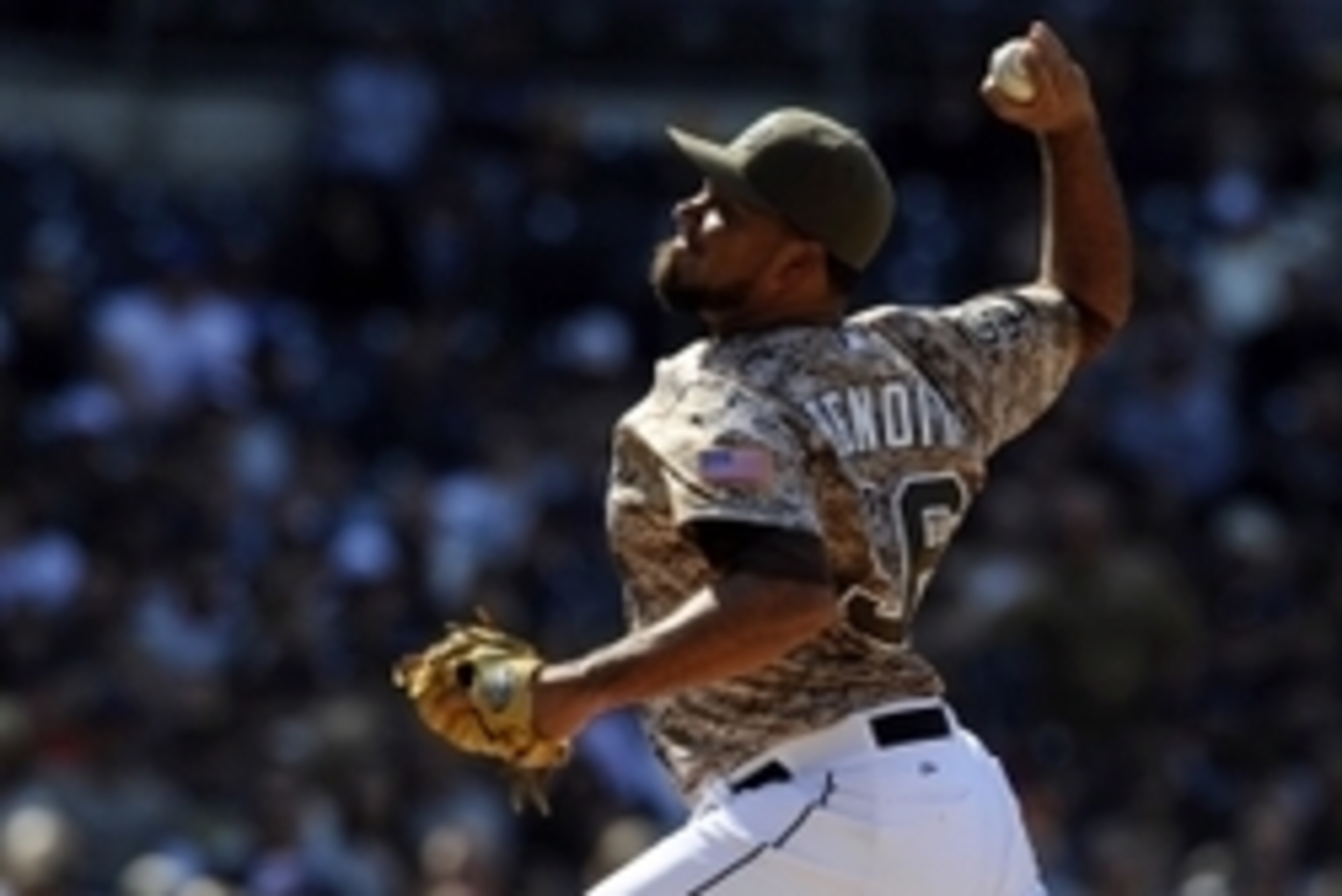 Apr 13, 2014; San Diego, CA, USA; San Diego Padres relief pitcher Joaquin Benoit (56) throws during the eighth inning against the Detroit Tigers at Petco Park. Mandatory Credit: Christopher Hanewinckel-USA TODAY Sports