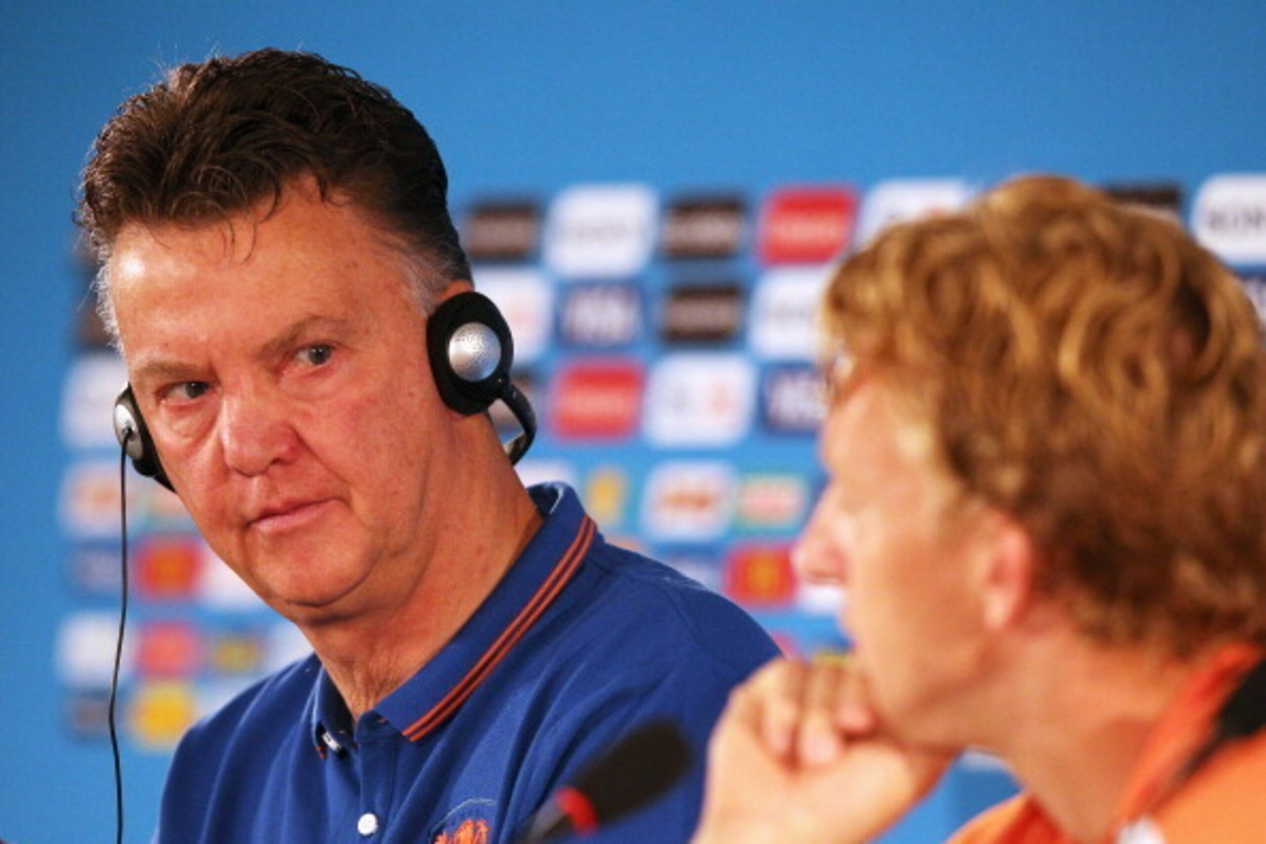 BRASILIA, BRAZIL - JULY 11:  Head coach, Louis van Gaal (L) and Dirk Kuyt speak to the media during the Netherlands press conference prior to their 3rd Place Playoff match between the Netherlands and Brazil at the 2014 FIFA World Cup at the Estadio Nacion