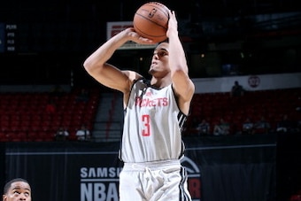 LAS VEGAS, NV - JULY 19: Nick Johnson #3 of the Houston Rockets shoots against the Atlanta Hawks during the Samsung NBA Summer League 2014 on July 19, 2014 at the Cox Pavilion in Las Vegas, Nevada. NOTE TO USER: User expressly acknowledges and agrees that