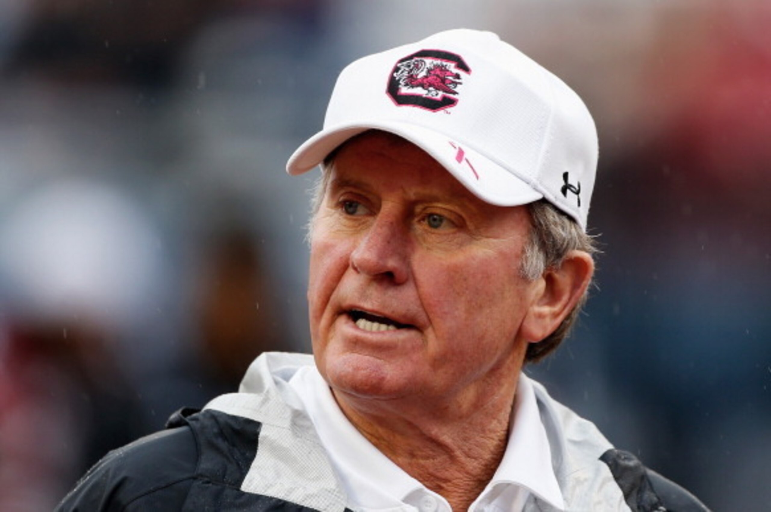 ORLANDO, FL - JANUARY 01:  Head coach Steve Spurrier of the South Carolina Gamecocks walks off the field before the start of their game against the Wisconsin Badgers at the Capital One Bowl on January 1, 2014 in Orlando, Florida.  (Photo by Scott Halleran