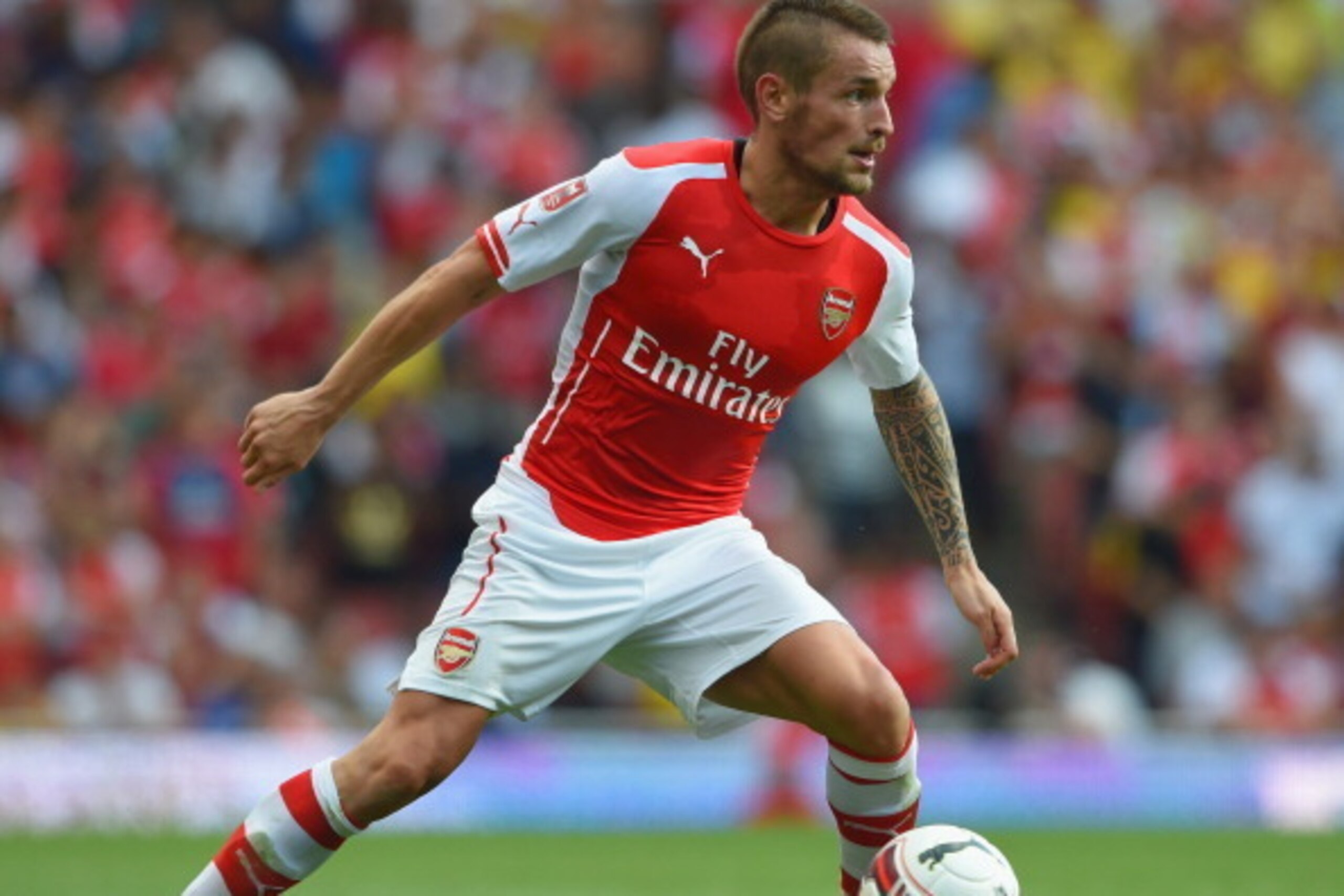 LONDON, ENGLAND - AUGUST 03:  Mathieu Debuchy of Arsenal in action during the Emirates Cup match between Arsenal and AS Monaco at the Emirates Stadium on August 3, 2014 in London, England.  (Photo by Michael Regan/Getty Images)