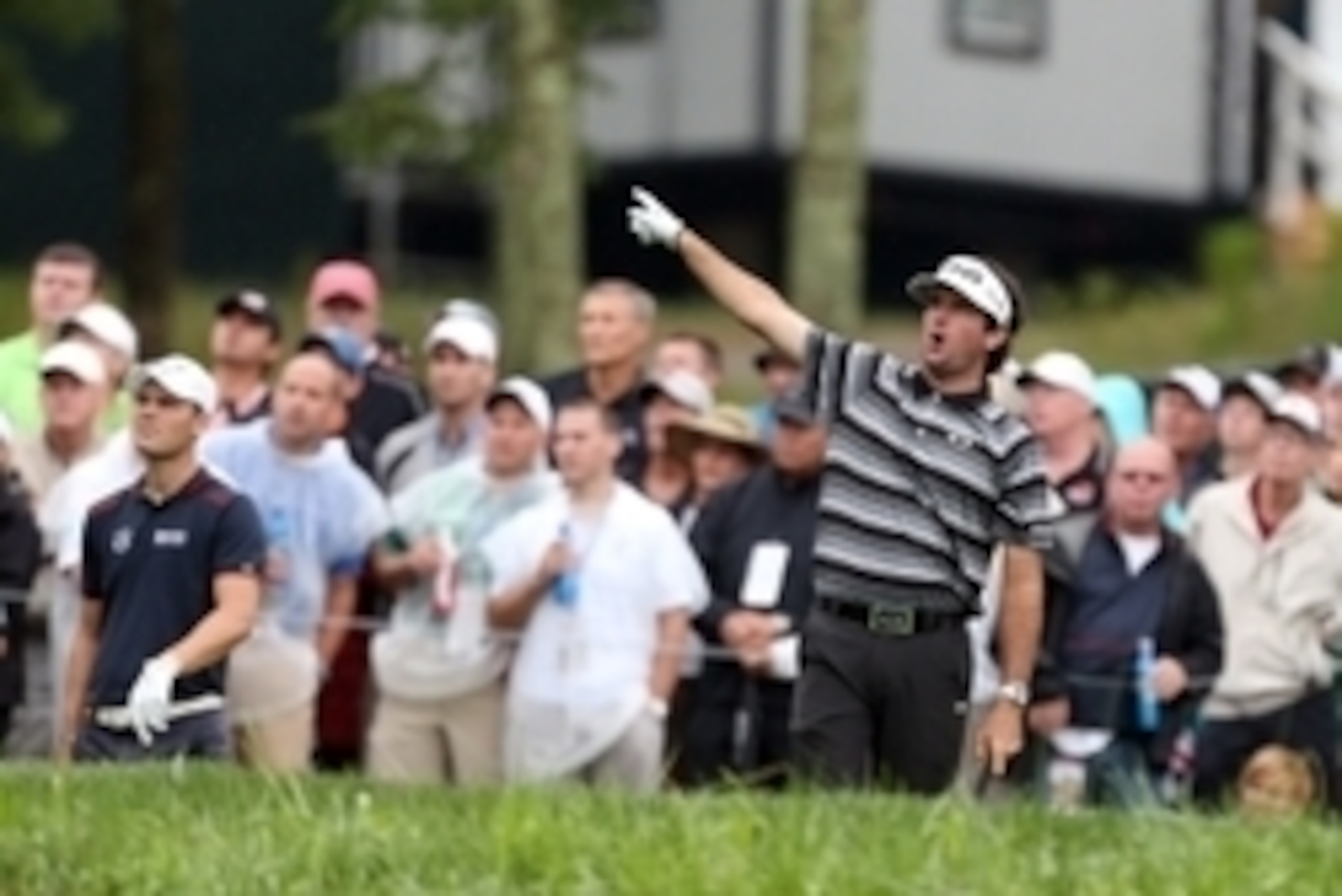Aug 8, 2014; Louisville, KY, USA; PGA golfer Bubba Watson points that he hit his tee shot offline on the 14th hole during the second round of the 2014 PGA Championship golf tournament at Valhalla Golf Club. Mandatory Credit: Brian Spurlock-USA TODAY Sport