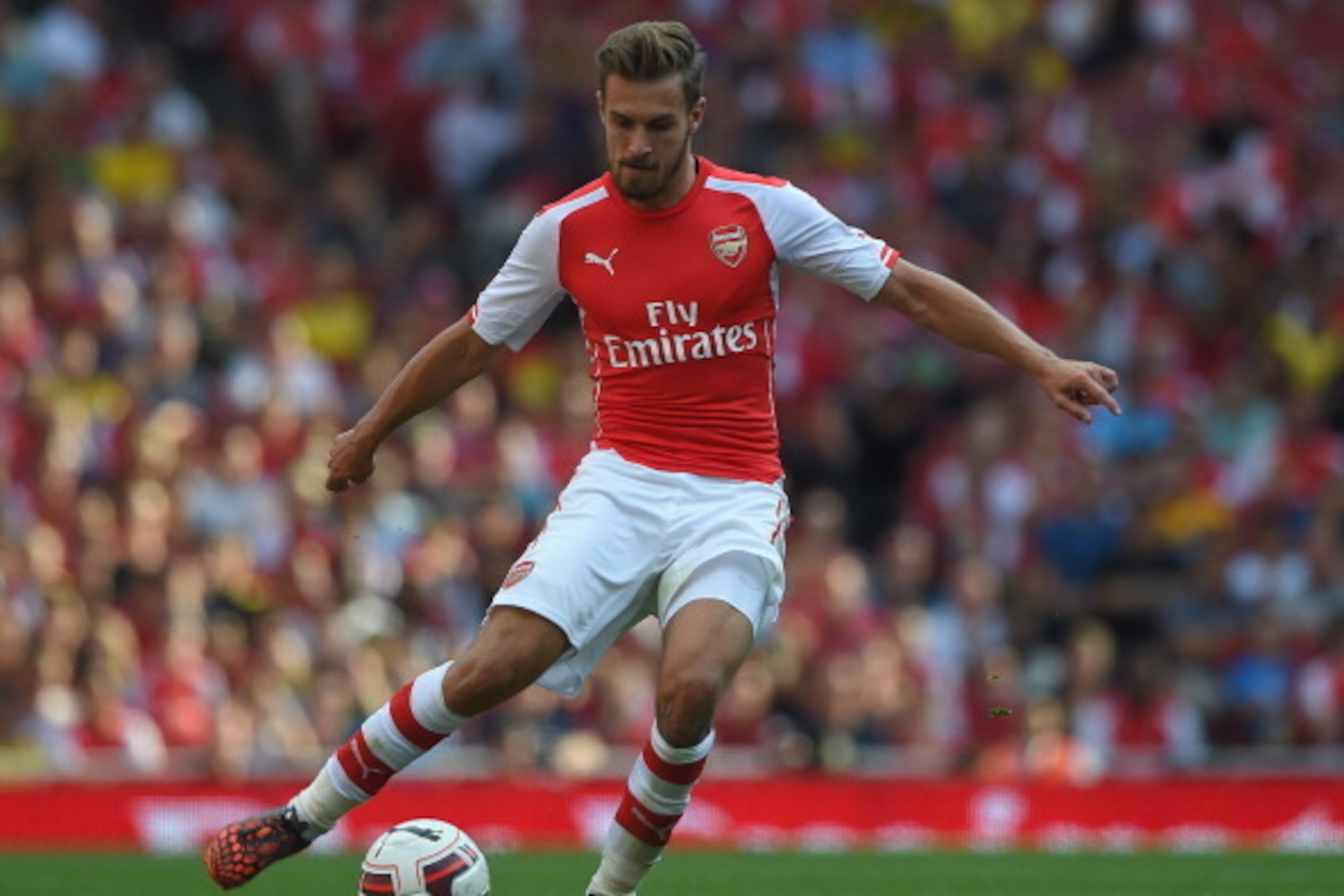 LONDON, ENGLAND - AUGUST 03:  Aaron Ramsey of Arsenal in action during the Emirates Cup match between Arsenal and AS Monaco at the Emirates Stadium on August 3, 2014 in London, England.  (Photo by Michael Regan/Getty Images)