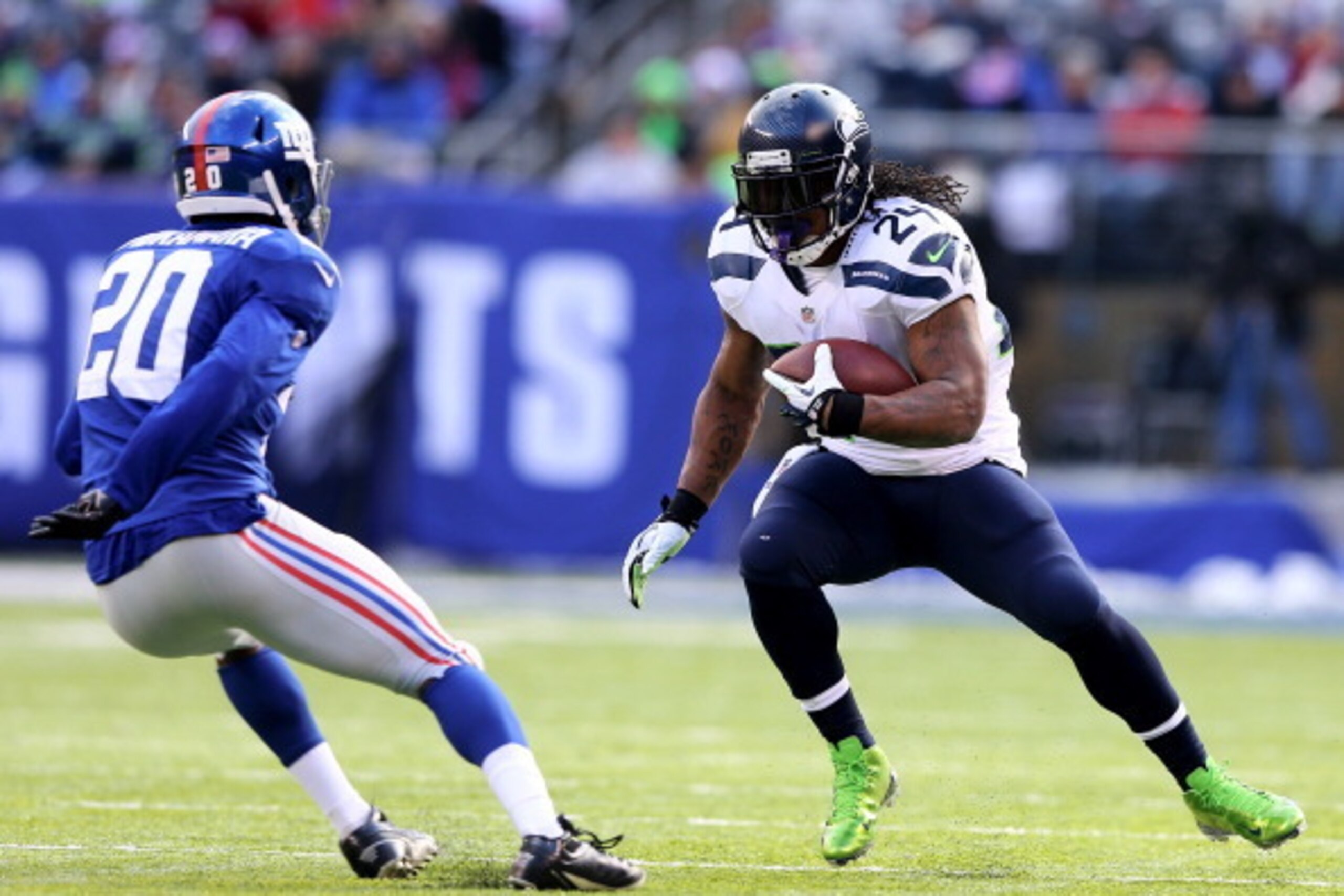 EAST RUTHERFORD, NJ - DECEMBER 15: Marshawn Lynch #24 of the Seattle Seahawks carries the ball as Prince Amukamara #20 of the New York Giants defends at MetLife Stadium on December 15, 2013 in East Rutherford, New Jersey. (Photo by Elsa/Getty Images) EAST RUTHERFORD, NJ - DECEMBER 15: Marshawn Lynch #24 of the Seattle Seahawks carries the ball as Prince Amukamara #20 of the New York Giants defends at MetLife Stadium on December 15, 2013 in East Rutherford, New Jersey. (Photo by Elsa/Getty Images)