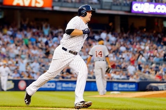 NEW YORK, NY - AUGUST 05:  Brian McCann #34 of the New York Yankees runs the bases after his second inning home run against David Price #14 of the Detroit Tigers at Yankee Stadium on August 5, 2014 in the Bronx borough of New York City.  (Photo by Jim McI