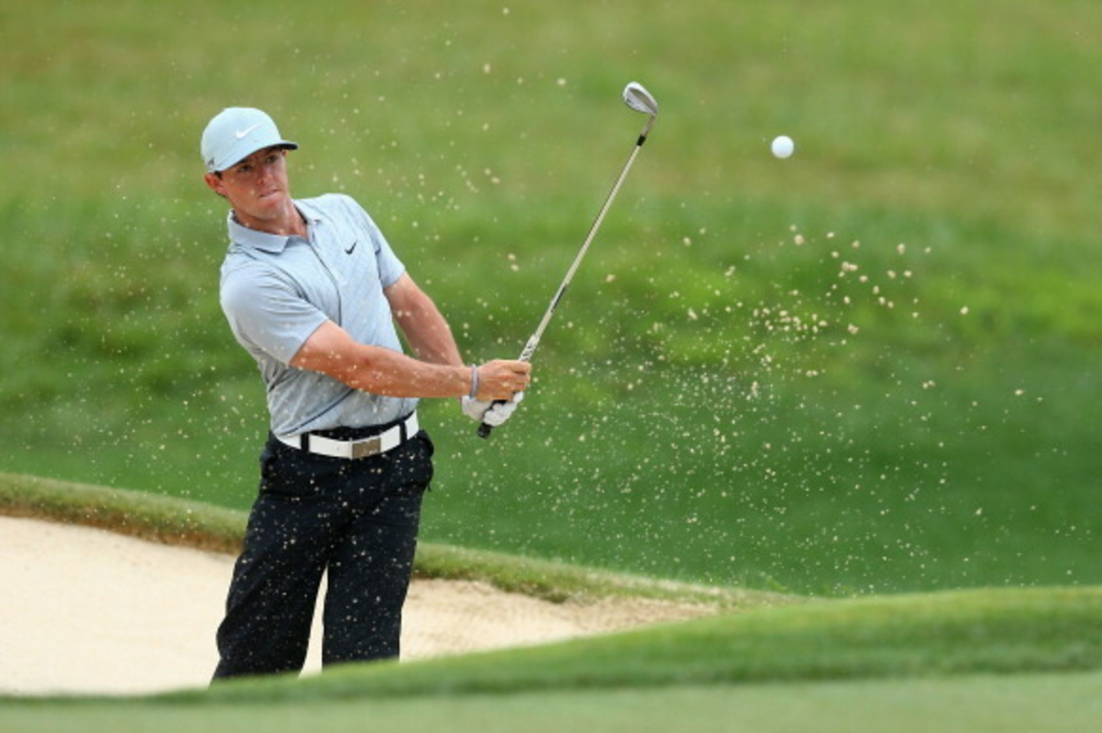 LOUISVILLE, KY - AUGUST 08:  Rory McIlroy of Northern Ireland plays a bunker shot on the fifth hole during the second round of the 96th PGA Championship at Valhalla Golf Club on August 8, 2014 in Louisville, Kentucky.  (Photo by Jeff Gross/Getty Images)