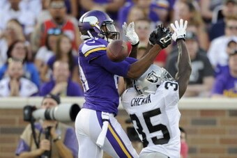 MINNEAPOLIS, MN - AUGUST 8: Chimdi Chekwa #35 of the Oakland Raiders breaks up a pass intended for Jerome Simpson #81 of the Minnesota Vikings during the second quarter of the game on August 8, 2014 at TCF Bank Stadium in Minneapolis, Minnesota. (Photo by