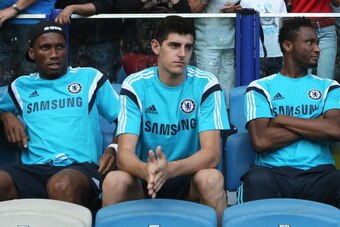 ARNHEM, NETHERLANDS - JULY 30:  (L-R)  Didier Drogba, Thibaut Courtois and John Obi Mikel of Chelsea watch from the stands prior to the pre season friendly match between Vitesse Arnhem and Chelsea at the Gelredome Stadium on July 30, 2014 in Arnhem, Nethe