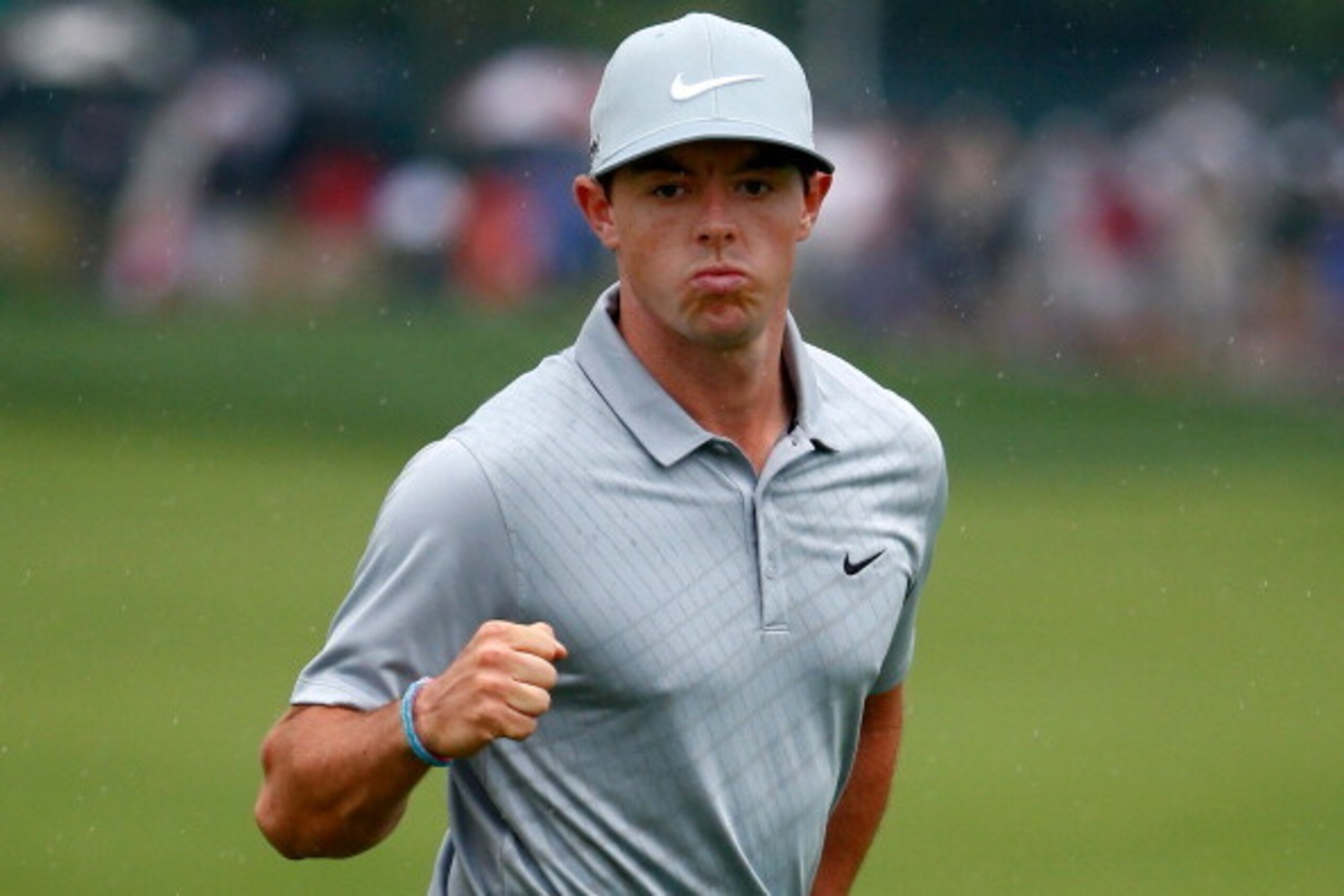 LOUISVILLE, KY - AUGUST 08:  Rory McIlroy of Northern Ireland celebrates an eagle putt on the 18th green during the second round of the 96th PGA Championship at Valhalla Golf Club on August 8, 2014 in Louisville, Kentucky.  (Photo by Sam Greenwood/Getty I