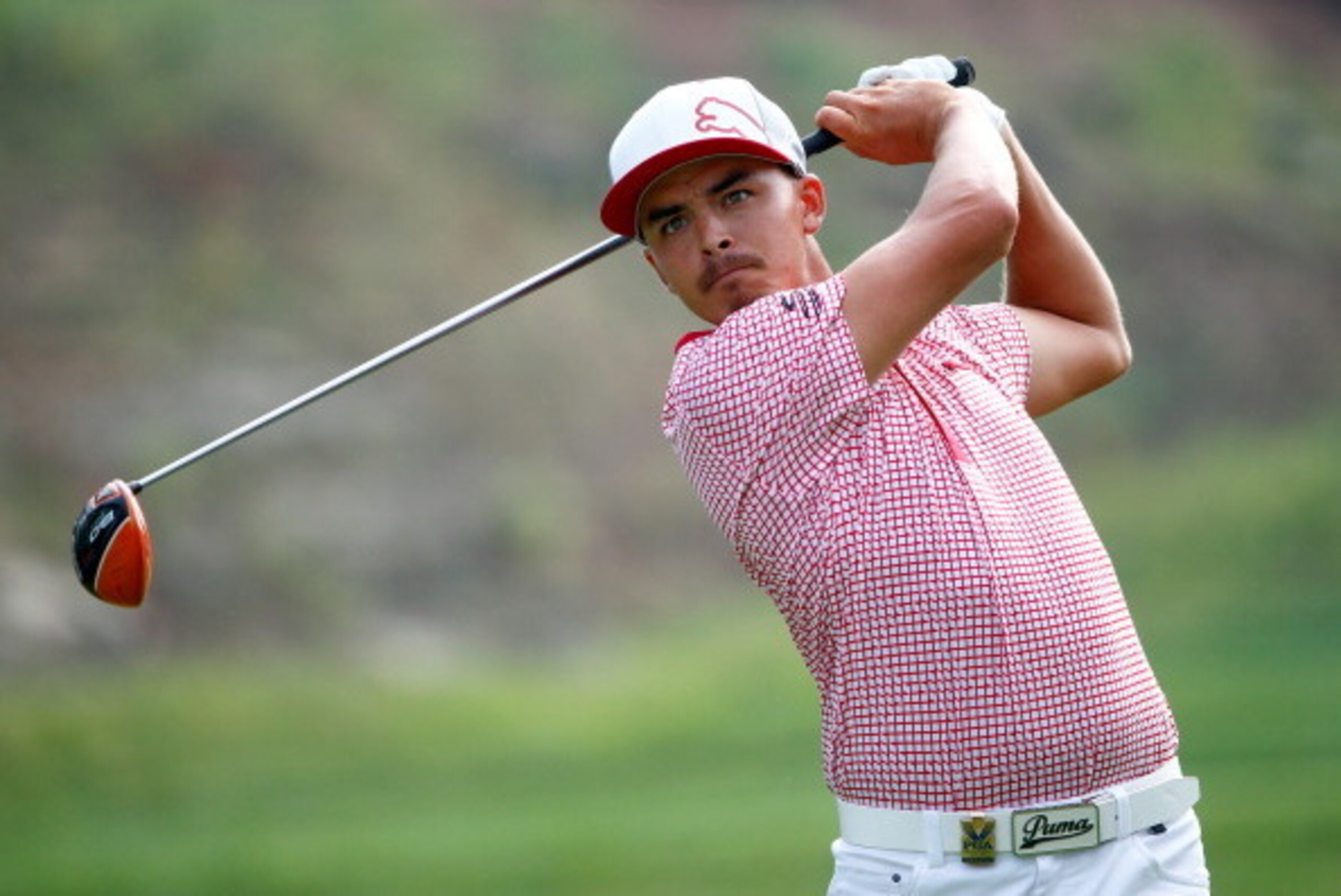 LOUISVILLE, KY - AUGUST 08:  Rickie Fowler of the United States hits his tee shot on the 15th hole during the second round of the 96th PGA Championship at Valhalla Golf Club on August 8, 2014 in Louisville, Kentucky.  (Photo by Sam Greenwood/Getty Images)