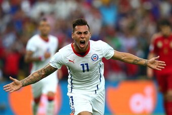 RIO DE JANEIRO, BRAZIL - JUNE 18:  Eduardo Vargas of Chile celebrates scoring his team's first goal during the 2014 FIFA World Cup Brazil Group B match between Spain and Chile at Maracana on June 18, 2014 in Rio de Janeiro, Brazil.  (Photo by Jamie Squire