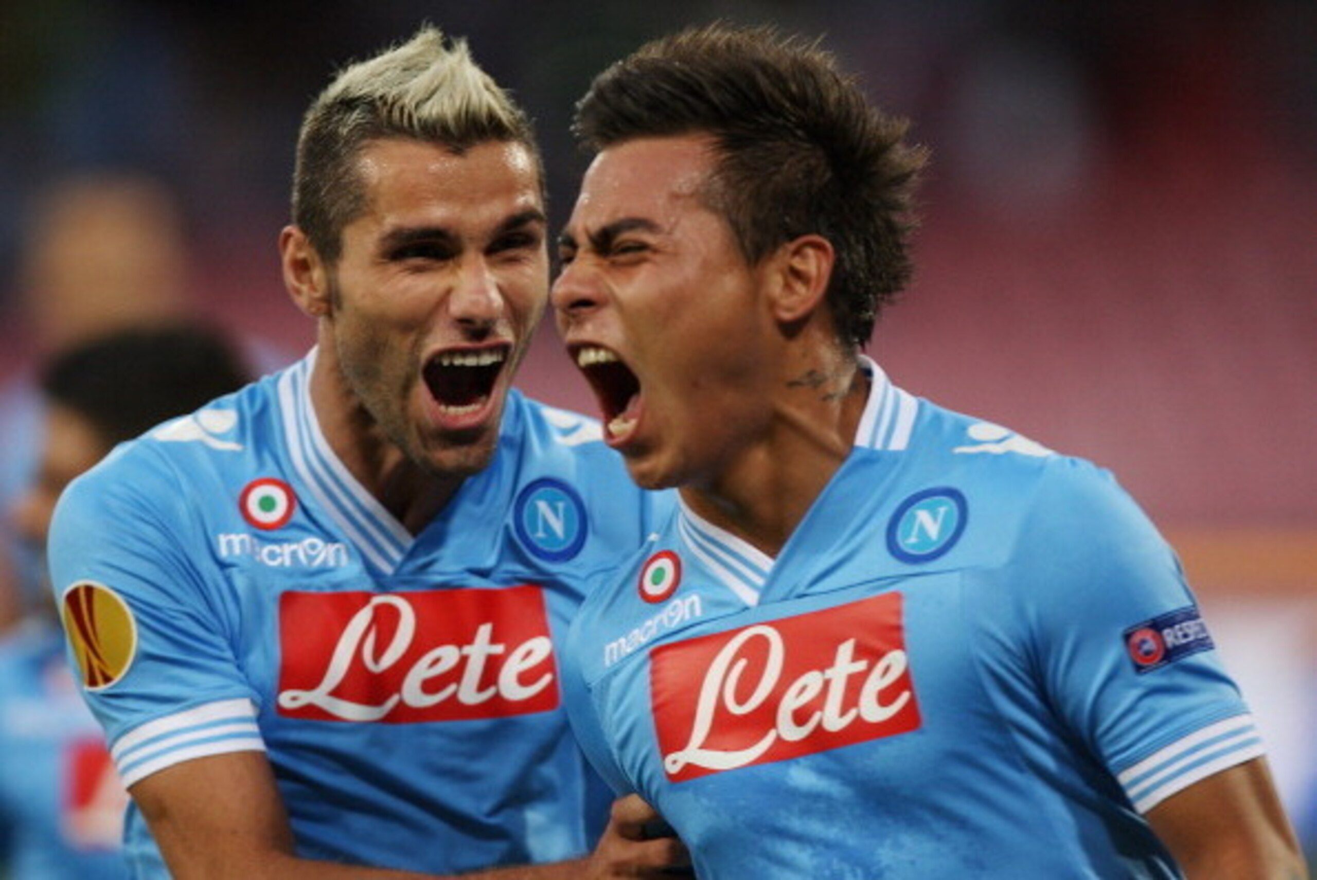 NAPLES, ITALY - SEPTEMBER 20: Eduardo Vargas with his teammate Valon Behrami of SSC Napoli celebrate after scoring the opening goal during the UEFA Europa League group F match between SSC Napoli and AIK Solna on September 20, 2012 in Naples, Italy. (Pho NAPLES, ITALY - SEPTEMBER 20: Eduardo Vargas with his teammate Valon Behrami of SSC Napoli celebrate after scoring the opening goal during the UEFA Europa League group F match between SSC Napoli and AIK Solna on September 20, 2012 in Naples, Italy. (Pho